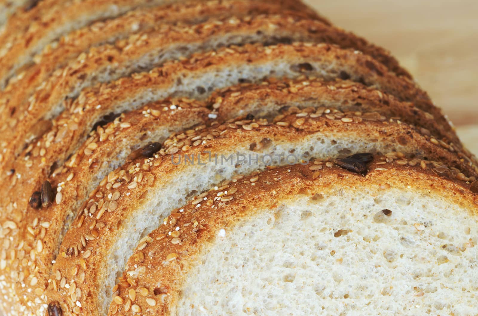 Whole grain sandwich sliced on cutting board