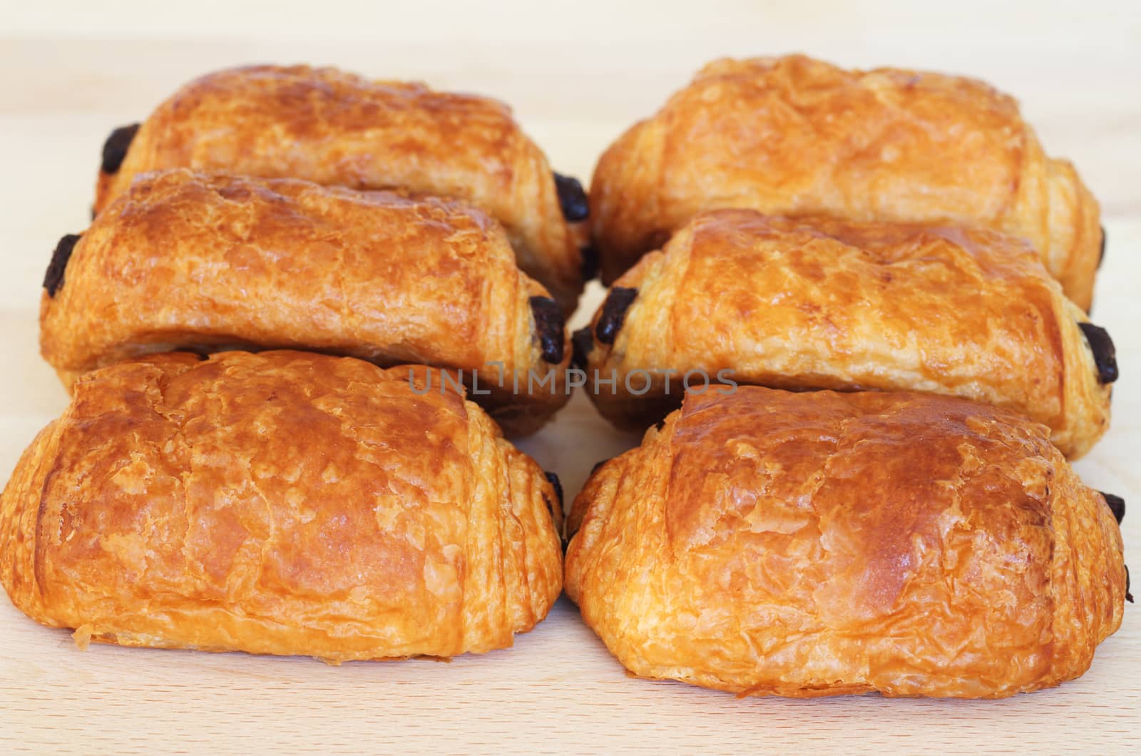 French chocolatine on  wooden cutting board