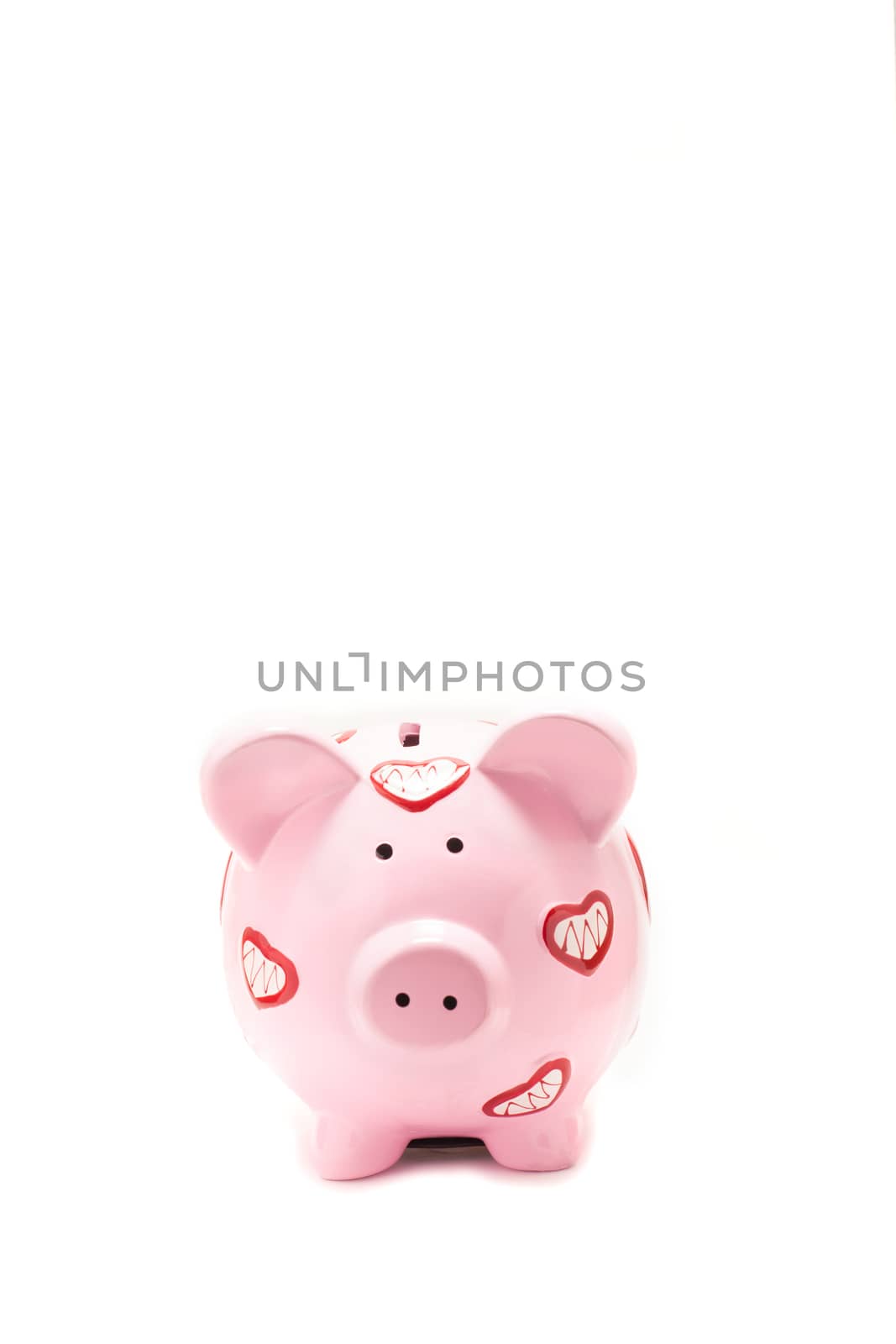 Pink piggy bank on white background 
