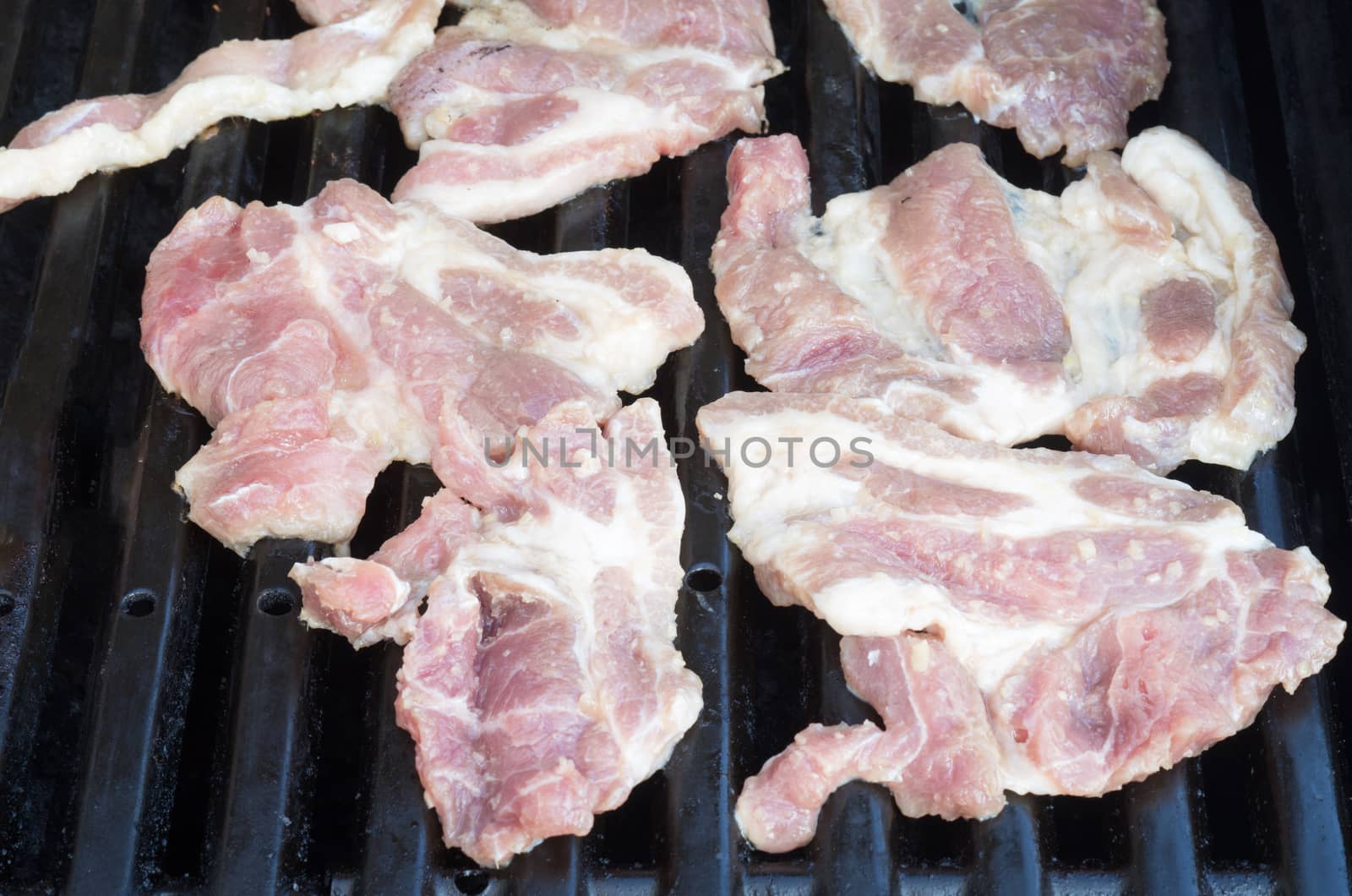 Vietnamese Marinaded Porc slices on grill