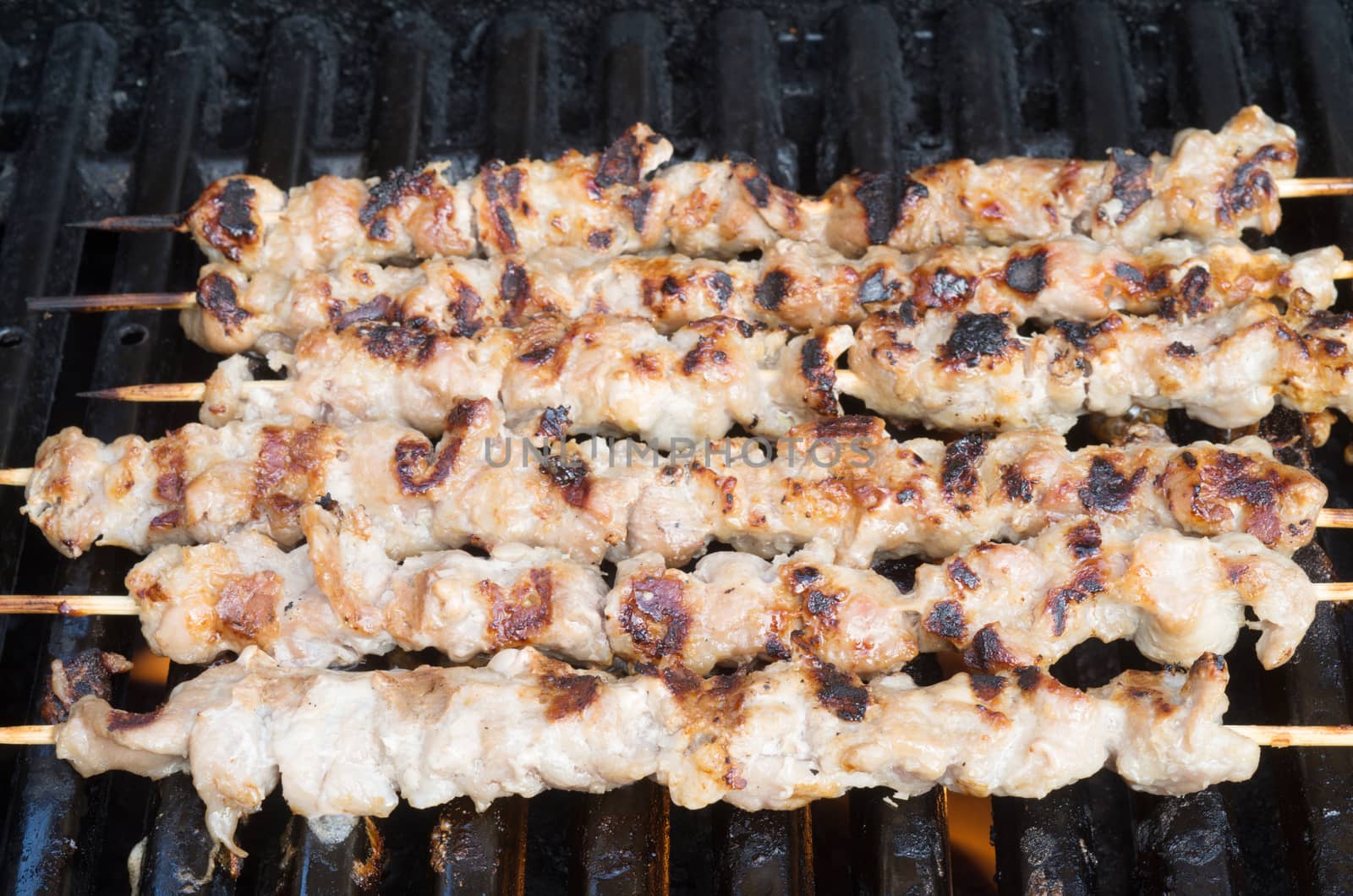 Vietnamese Porc skewers on grill