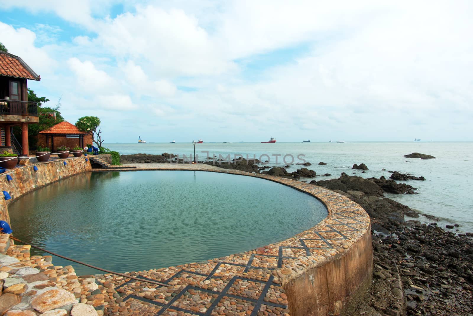 Cozy resort and pool by the sea in Vietnam