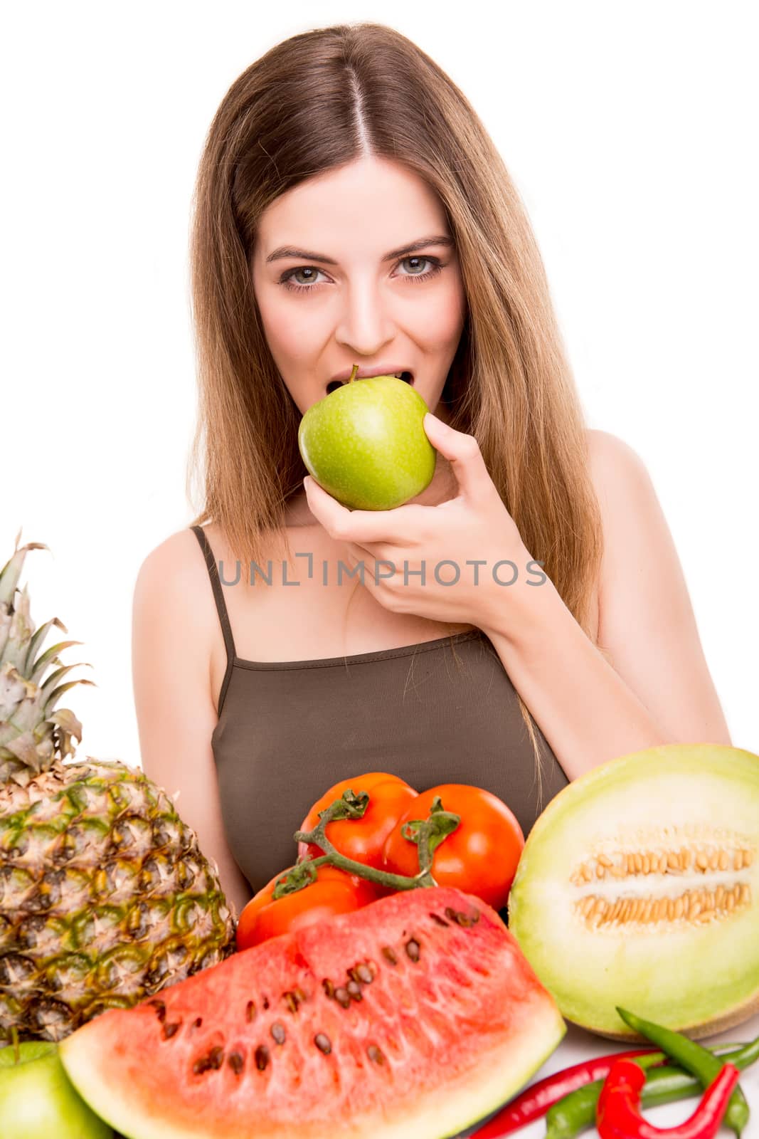 Woman with vegetables and fruits over white background