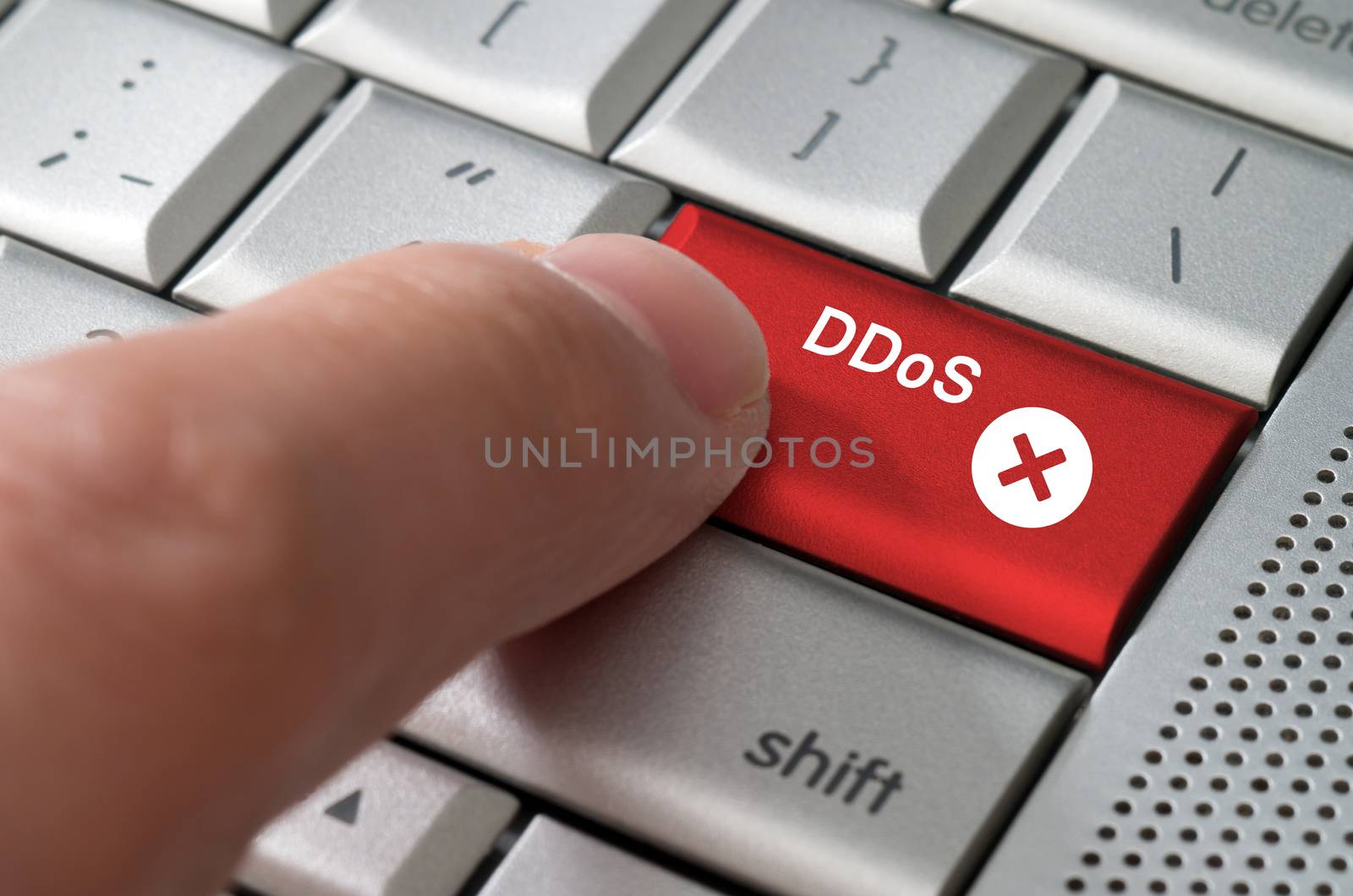 Business concept male finger pointing DDoS  key  by daoleduc