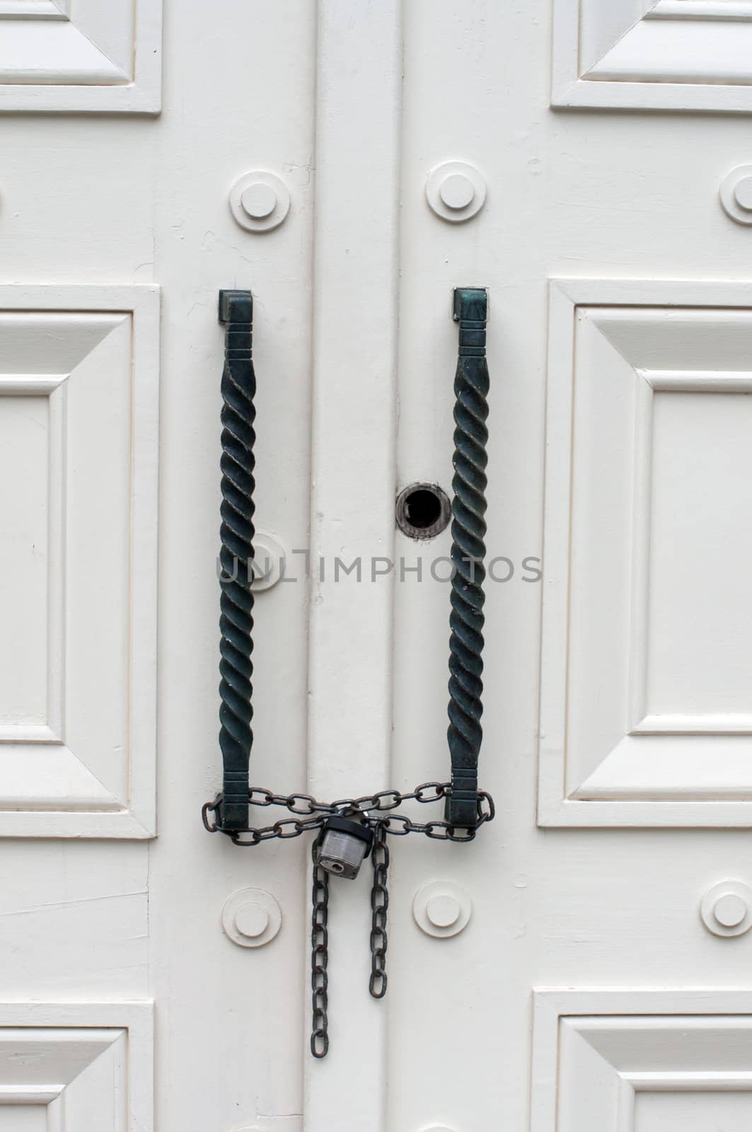 Locked and chained white doors by daoleduc