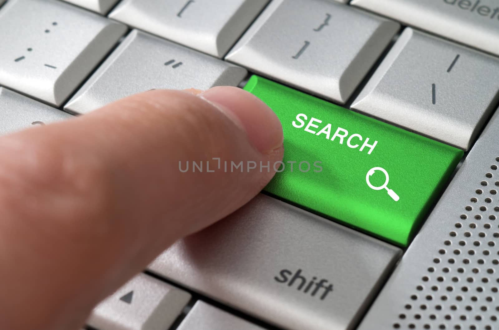 Business concept male finger pointing search key  by daoleduc