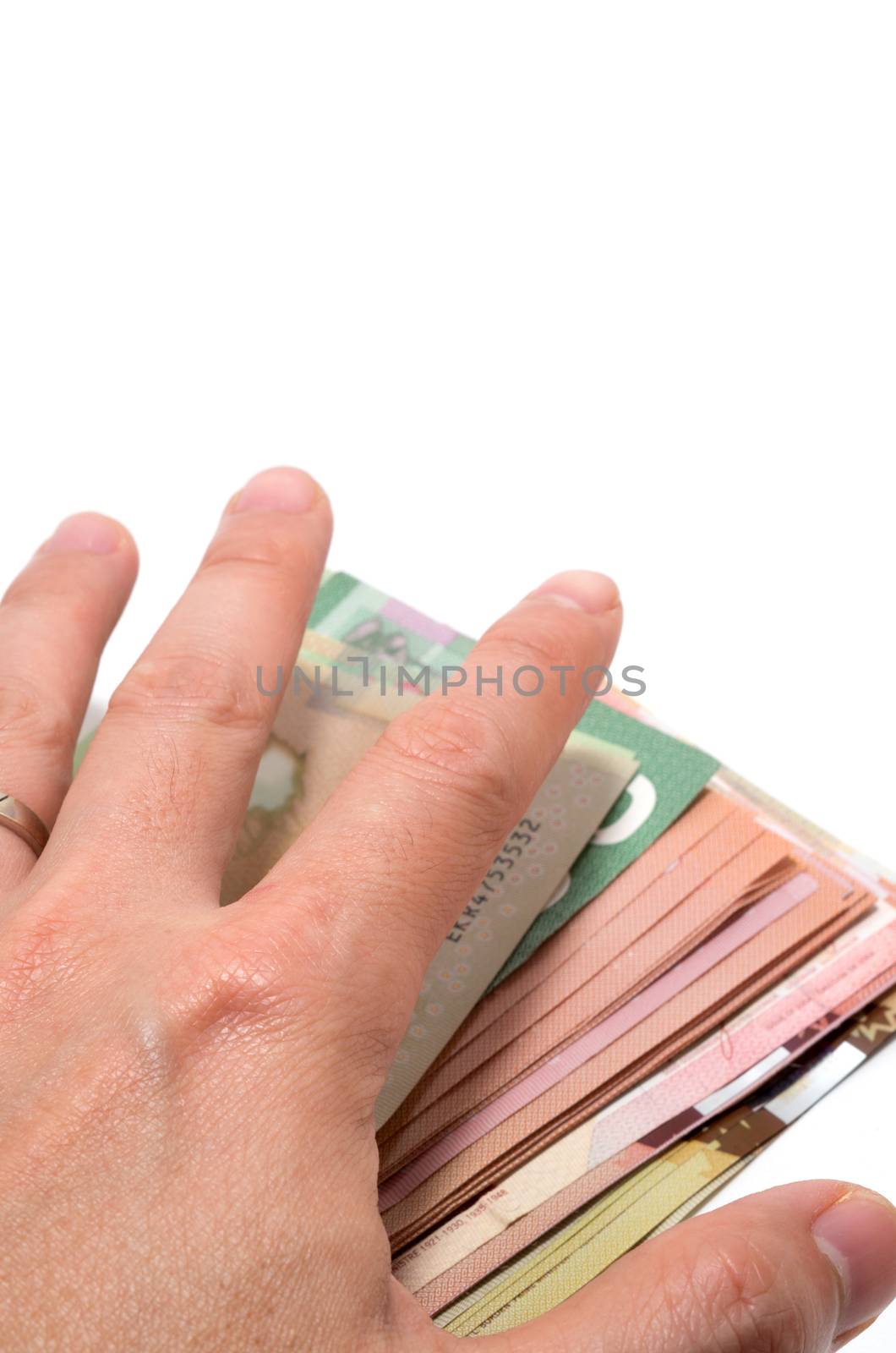 Hand hiding the stash of Canadian banknotes by daoleduc