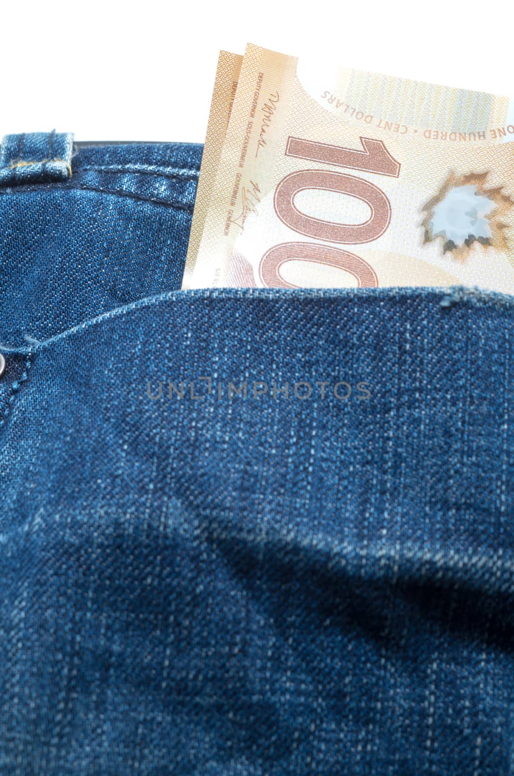 Hundred Canadian dollars bills in the back jean pocket 