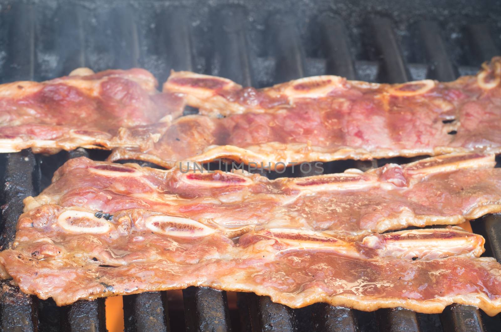 Korean short ribs grilled on a barbecue