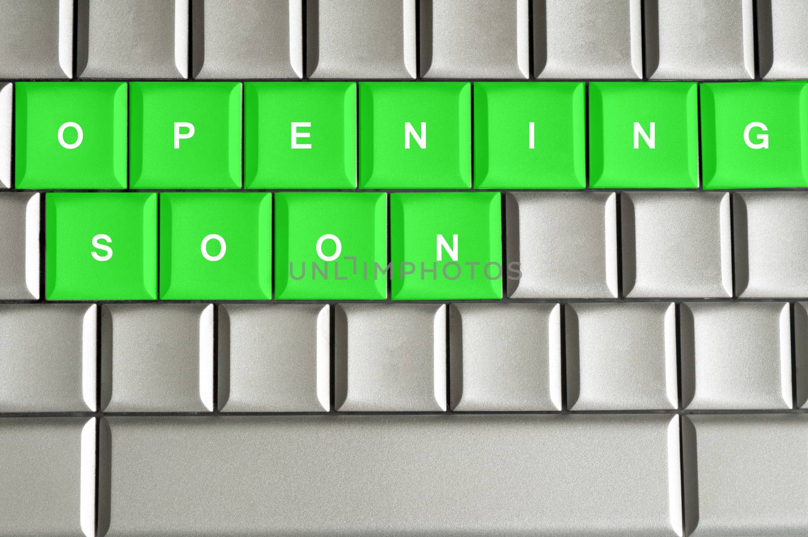 Opening Soon spelled on a metallic keyboard by daoleduc