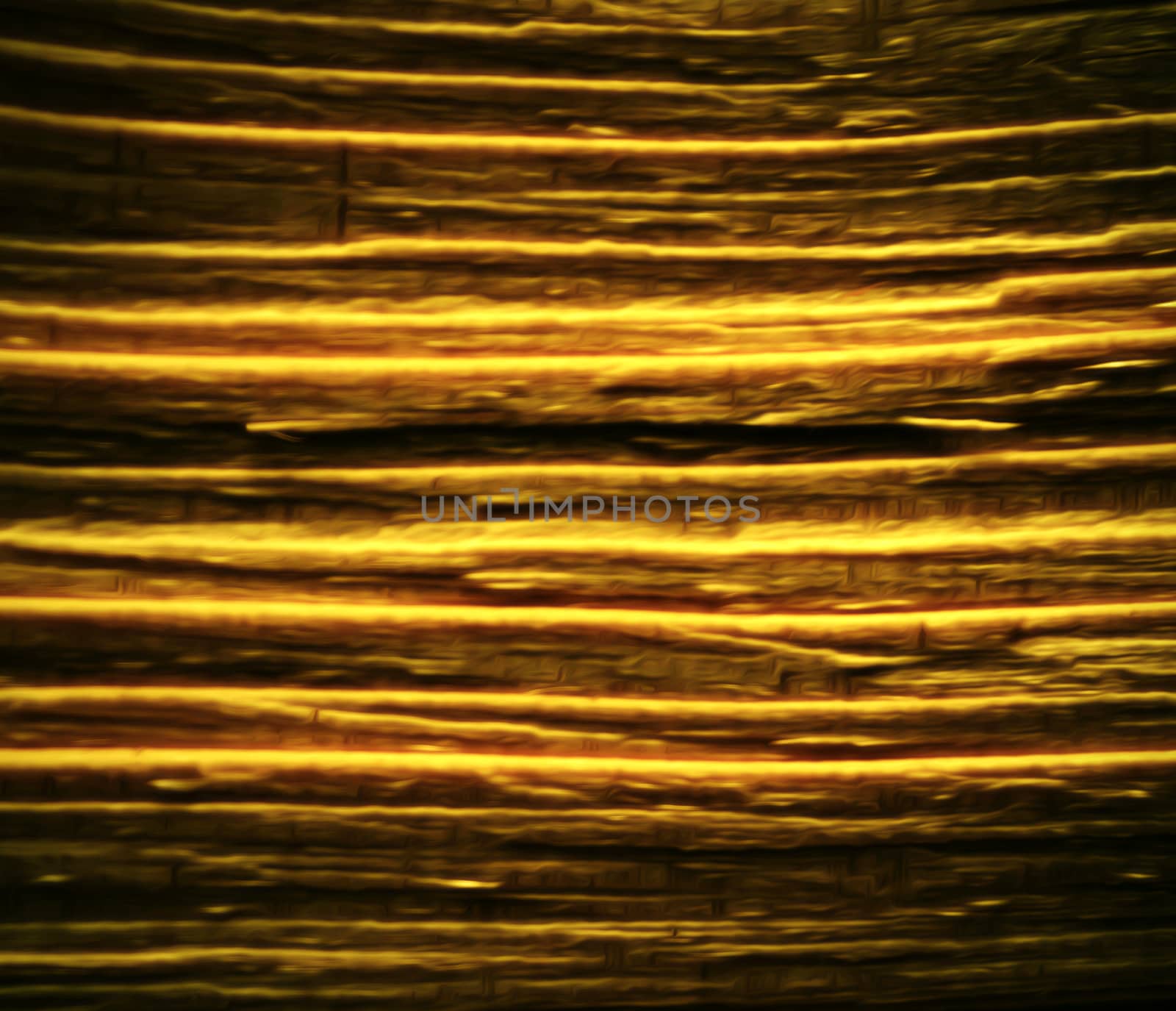 background or texture blurred golden colored striped pattern