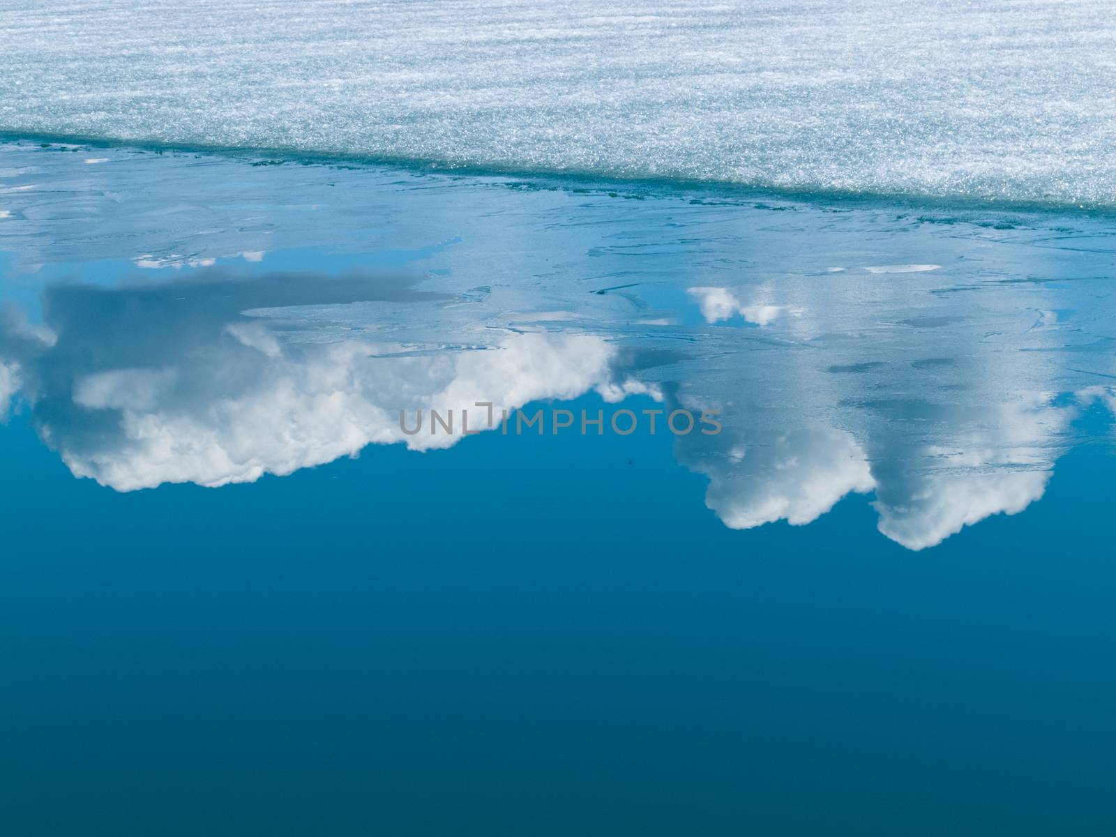 Climate change blue arctic water reflected clouds by PiLens