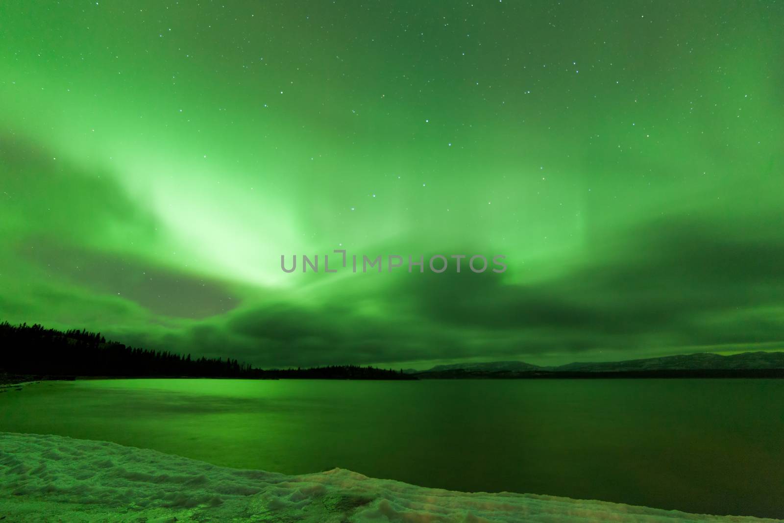 Northern Lights night sky over frozen Lake Laberge by PiLens