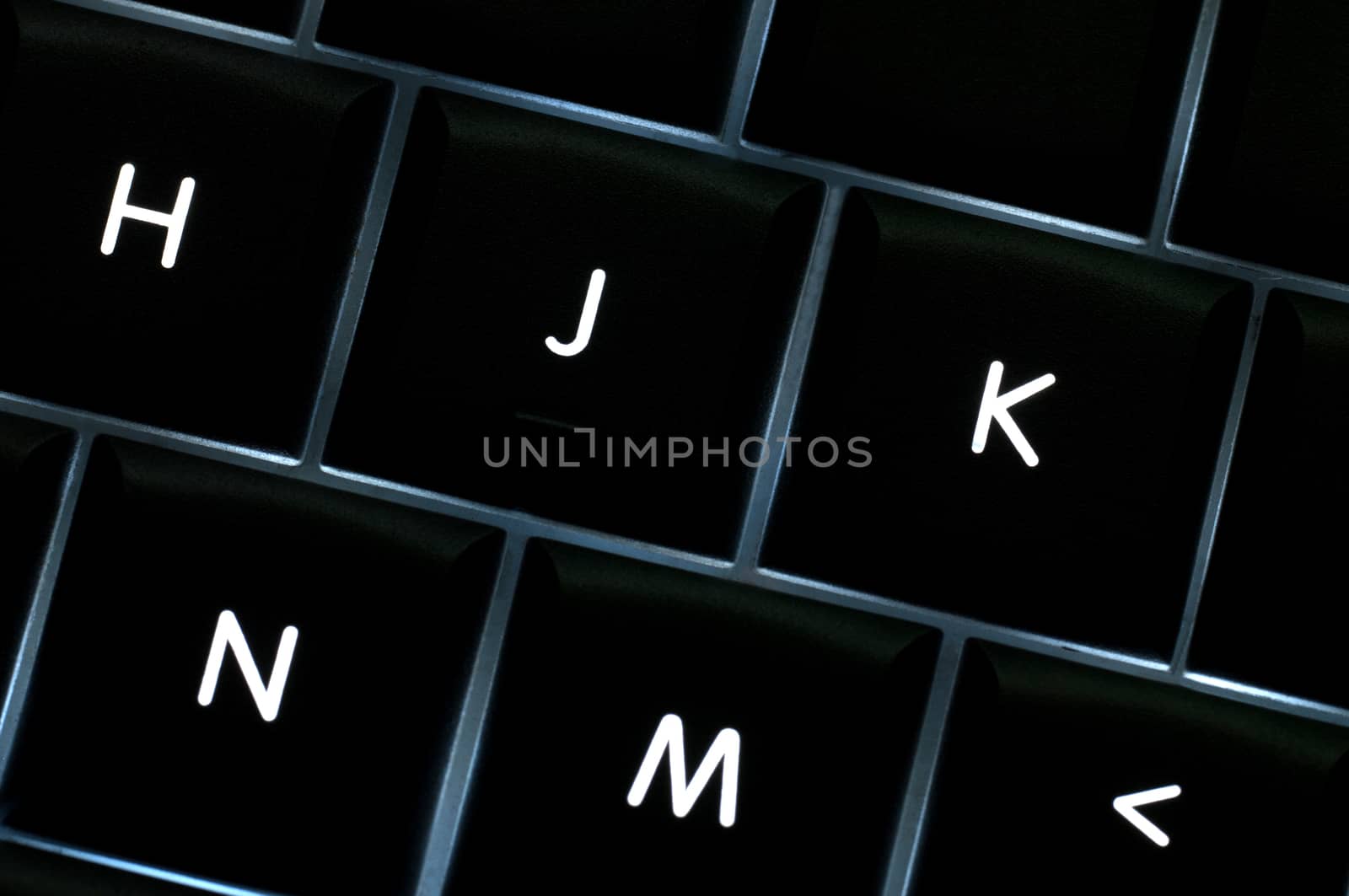H J K N M keys backlit on a keyboard