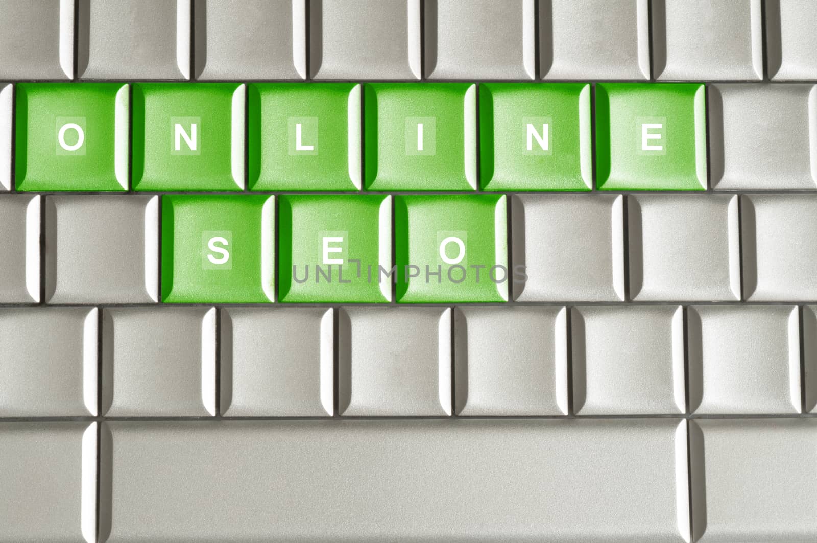 Metallic keyboard with the word ONLINE SEO by daoleduc