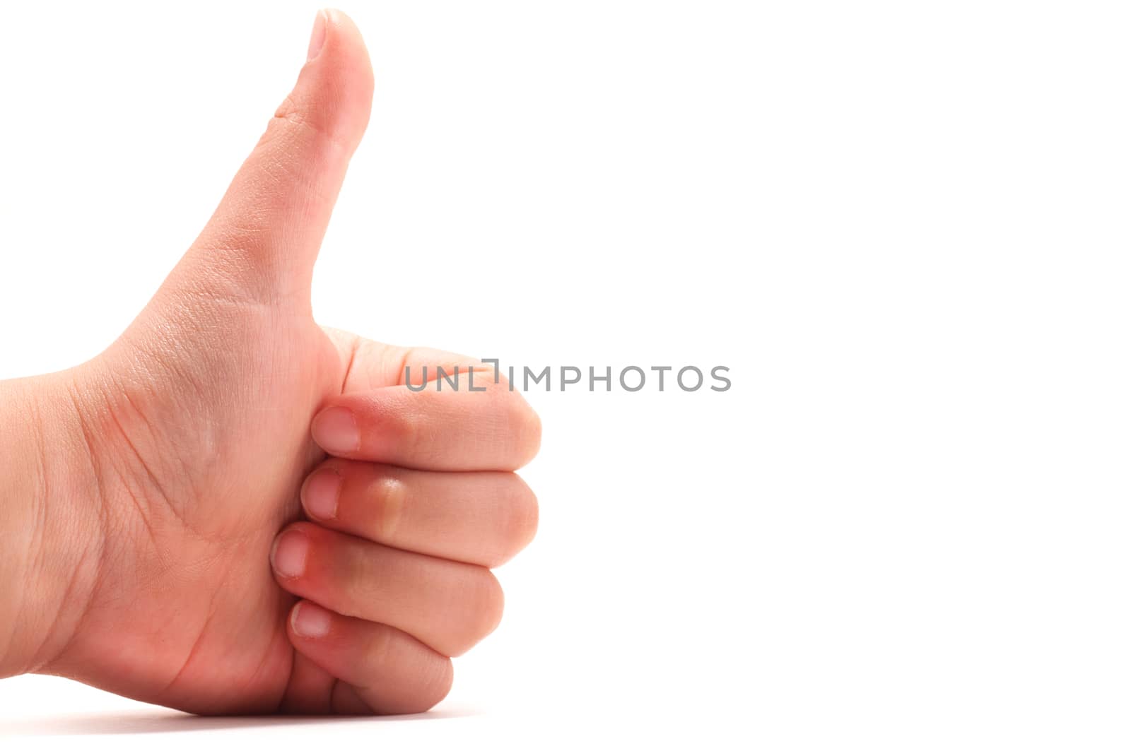 Child thumb up close-up isolated on white background