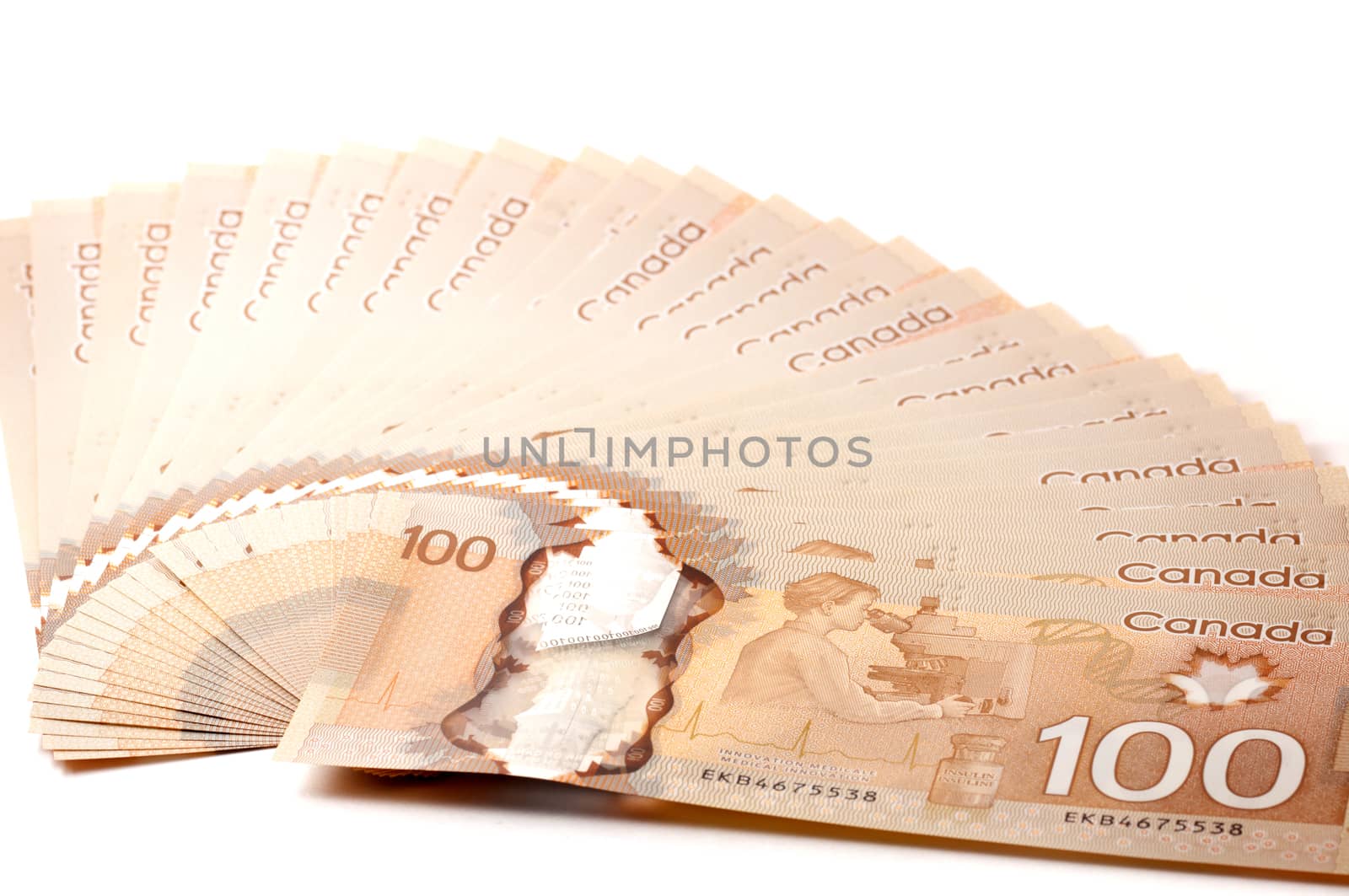 Canadian 100 dollar bills in polymer isolated on white background