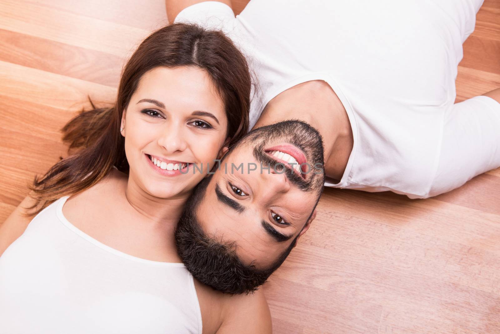 Love Couple at home relaxing on the floor