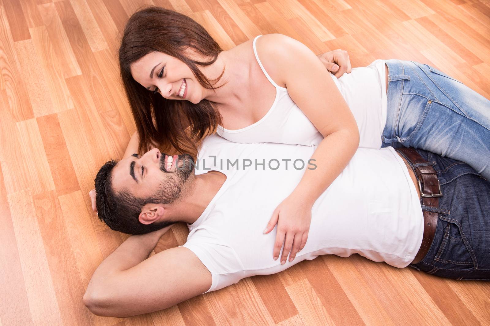 Love Couple at home relaxing on the floor