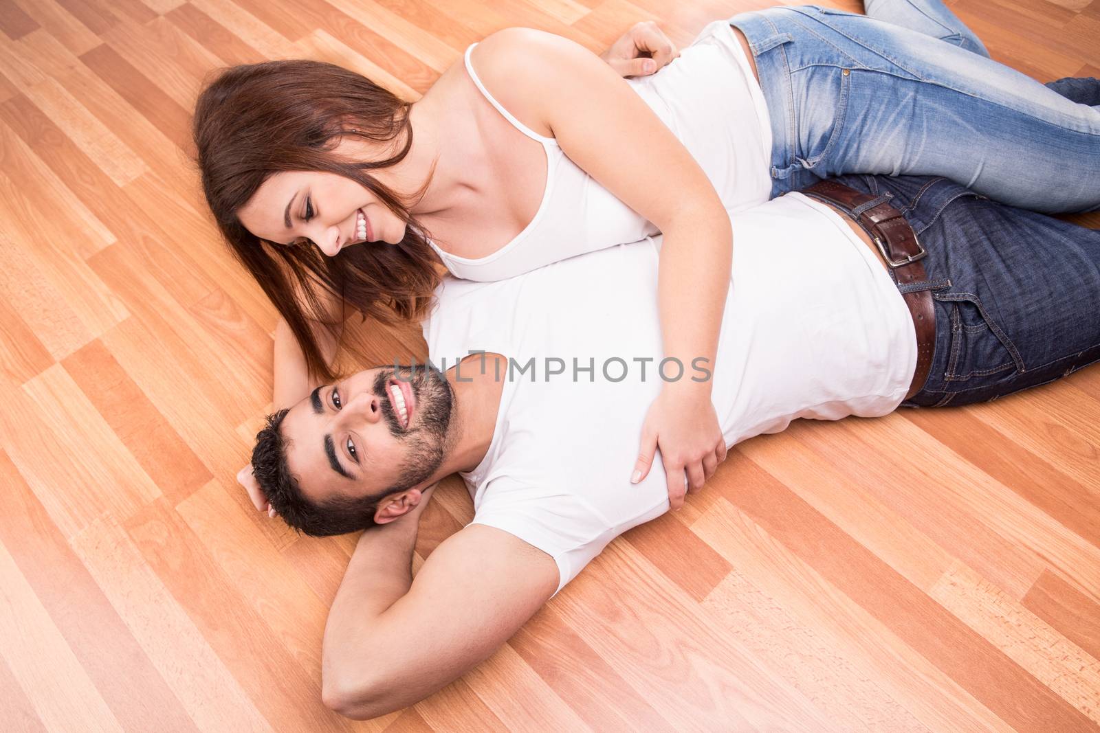 Love Couple at home relaxing on the floor