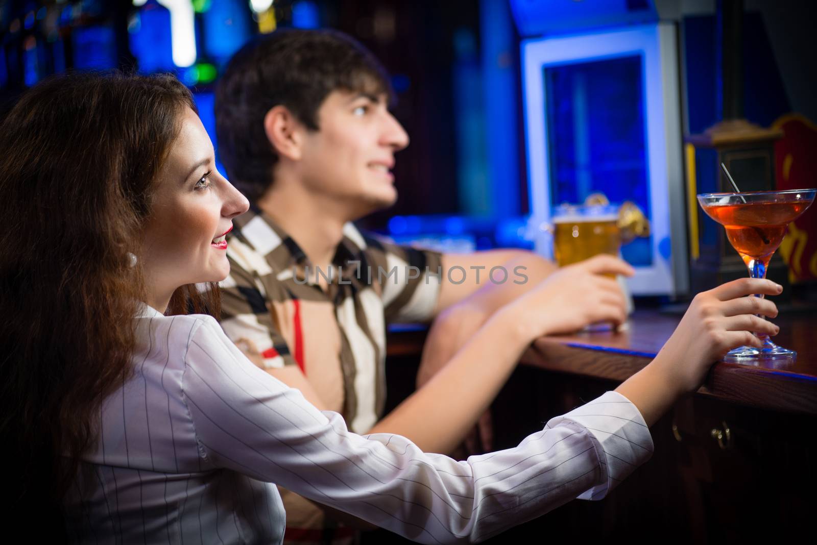 close-up portrait of a young woman in a bar