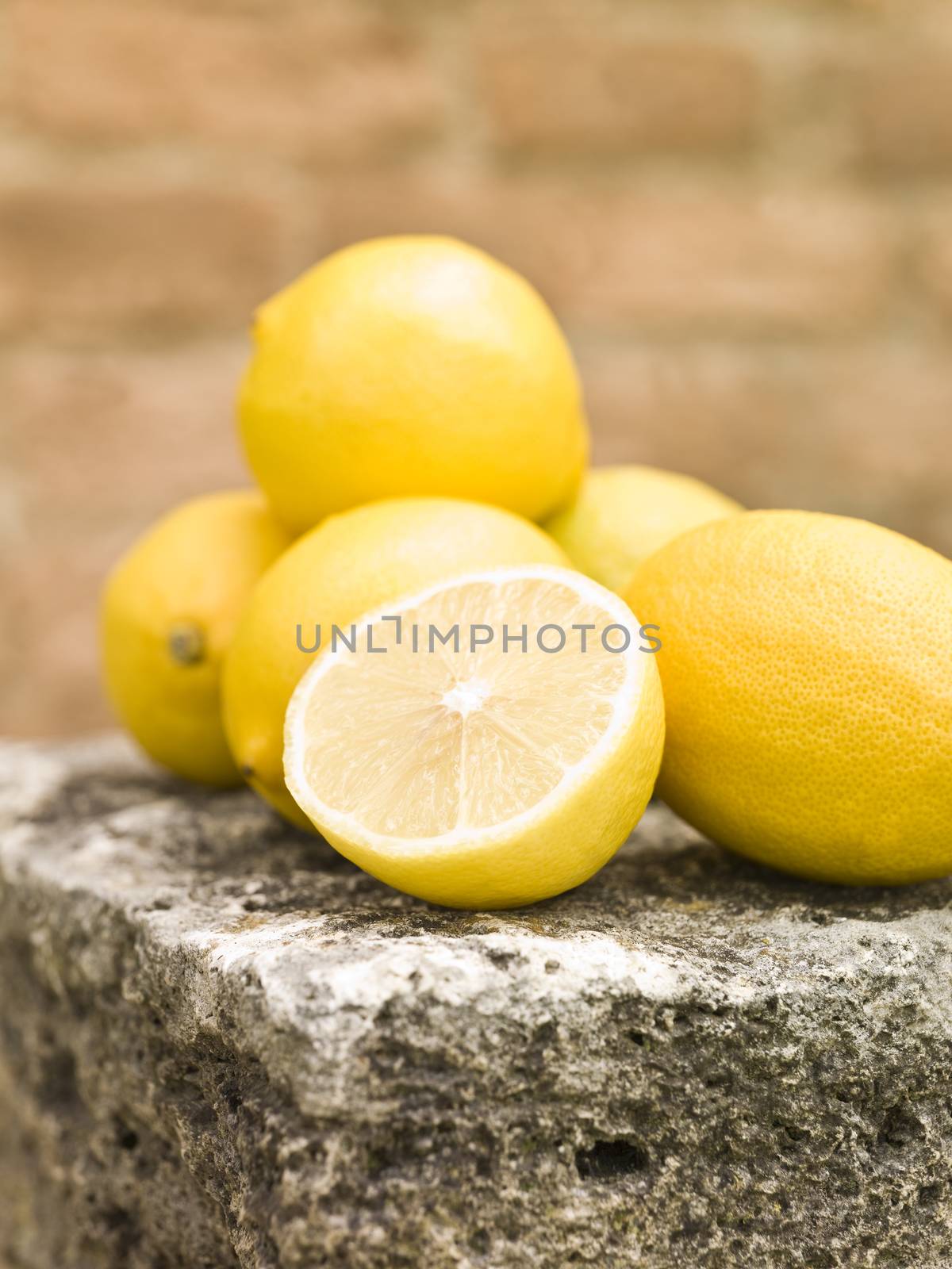 Group of Lemons on a rock tabel