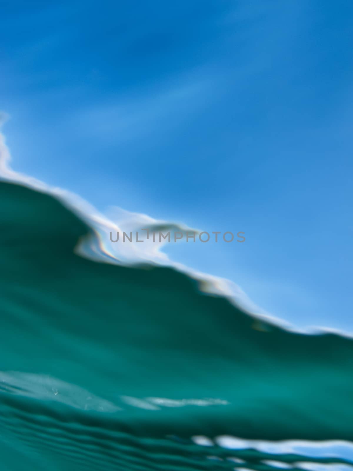 Lake landscape from underwater near wavy surface distorted color blur abstract backgound pattern