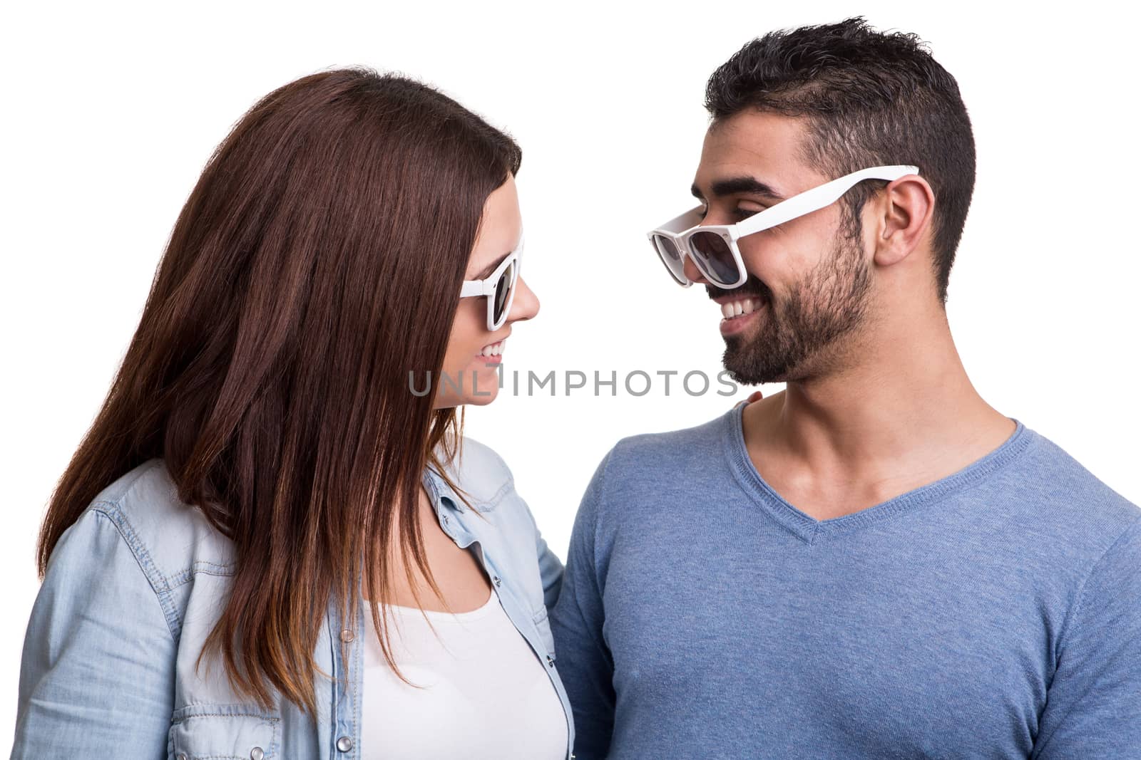 Portrait of a funny couple wearing sunglasses 