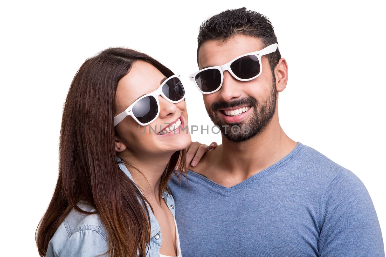 Portrait of a funny couple wearing sunglasses 