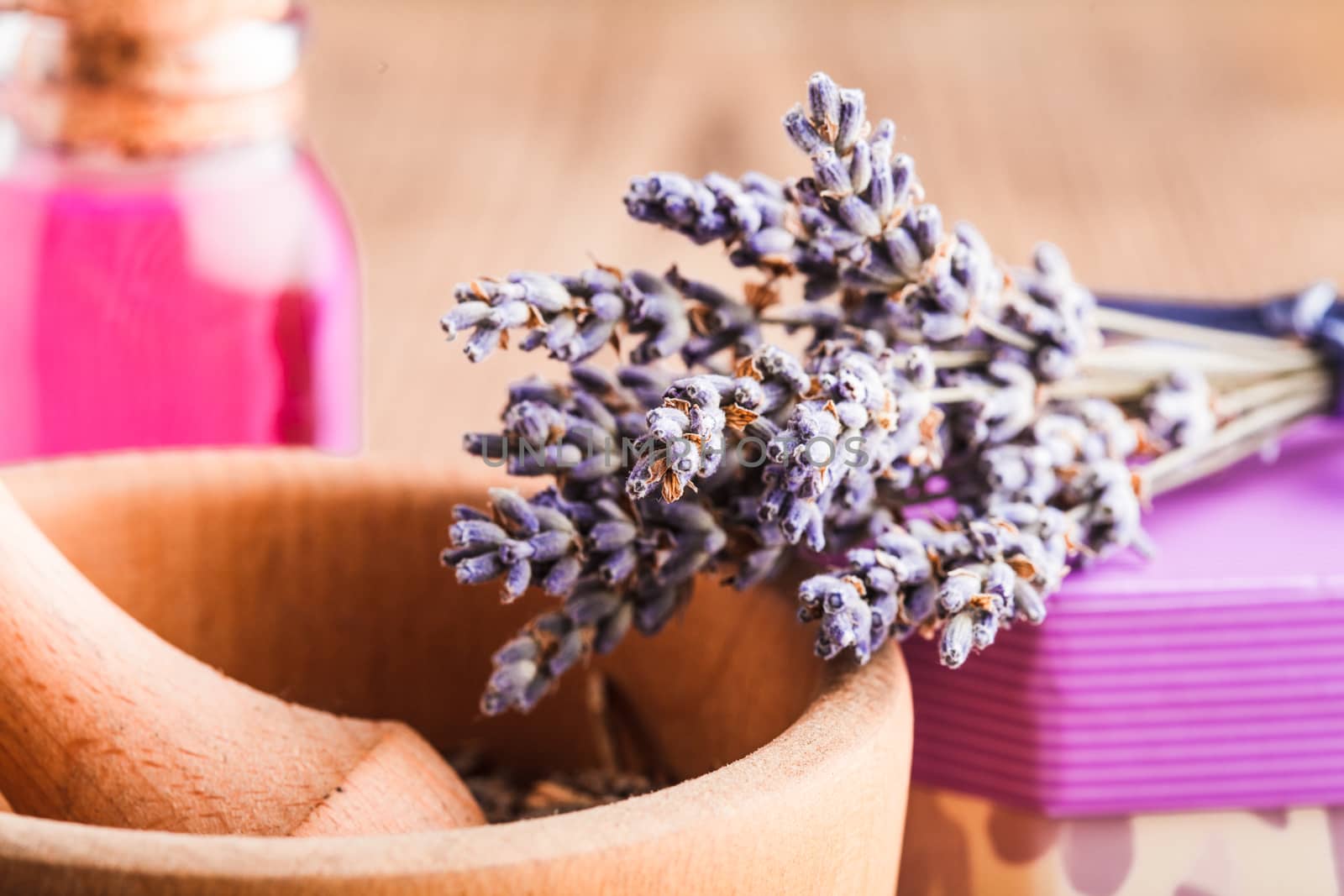 Dry lavender bunch and wooden mortar, preparation