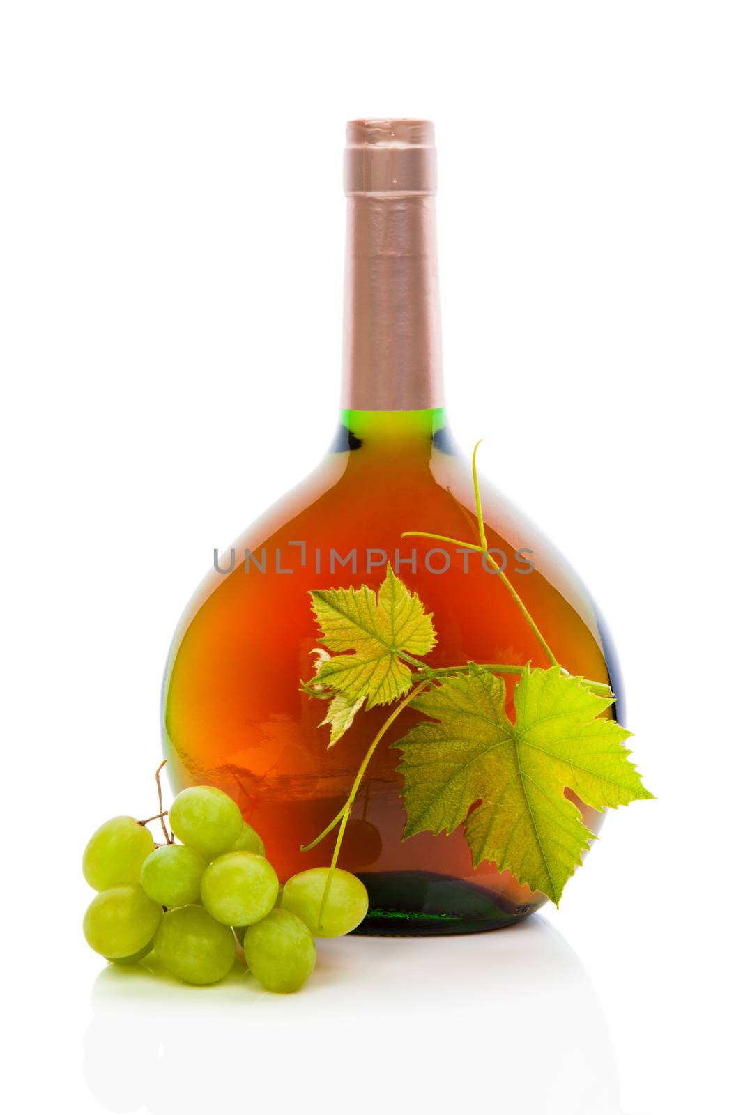 Wine bottle with wine grapes and grape leaves. by eskymaks