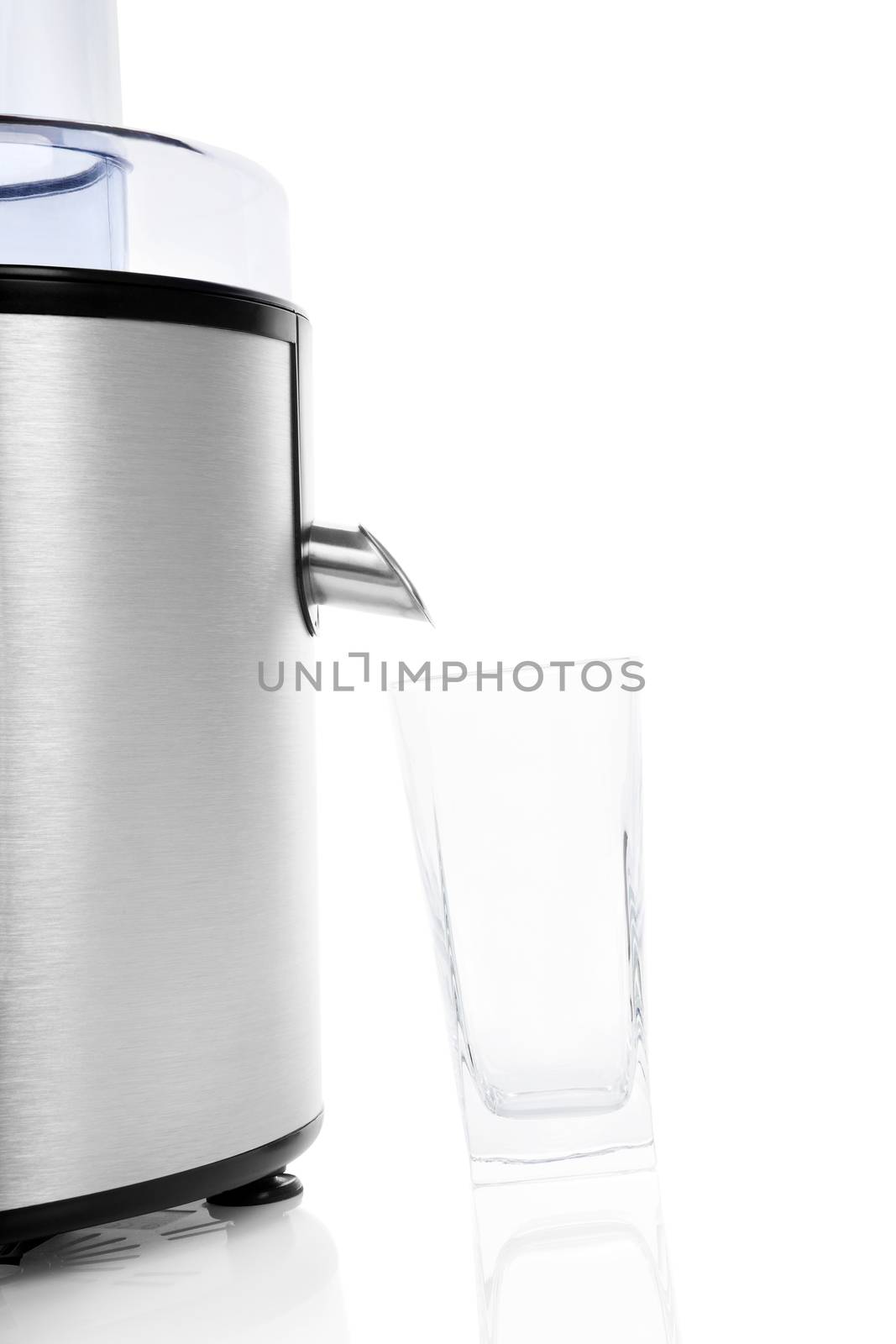 Clean silver juicer with empty glass isolated on white background with reflection. Healthy lifestyle, minimal sparse contemporary styles.