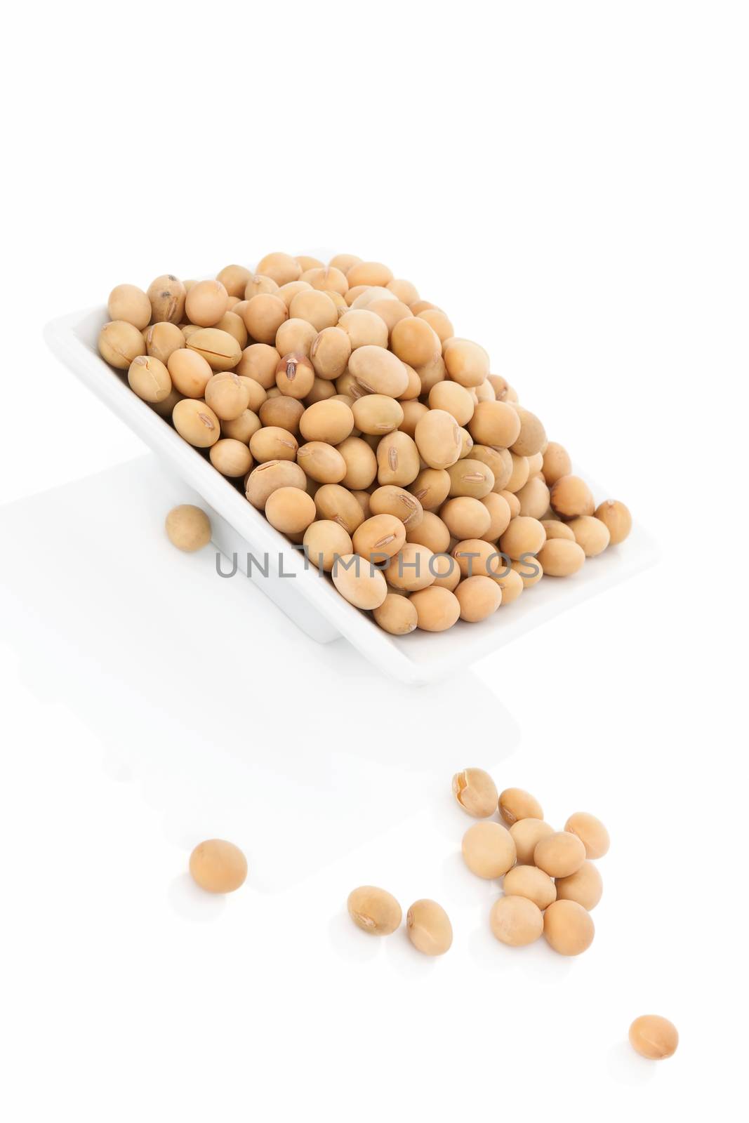 Soybeans isolated on white background. Vegetarian and vegan eating concept.