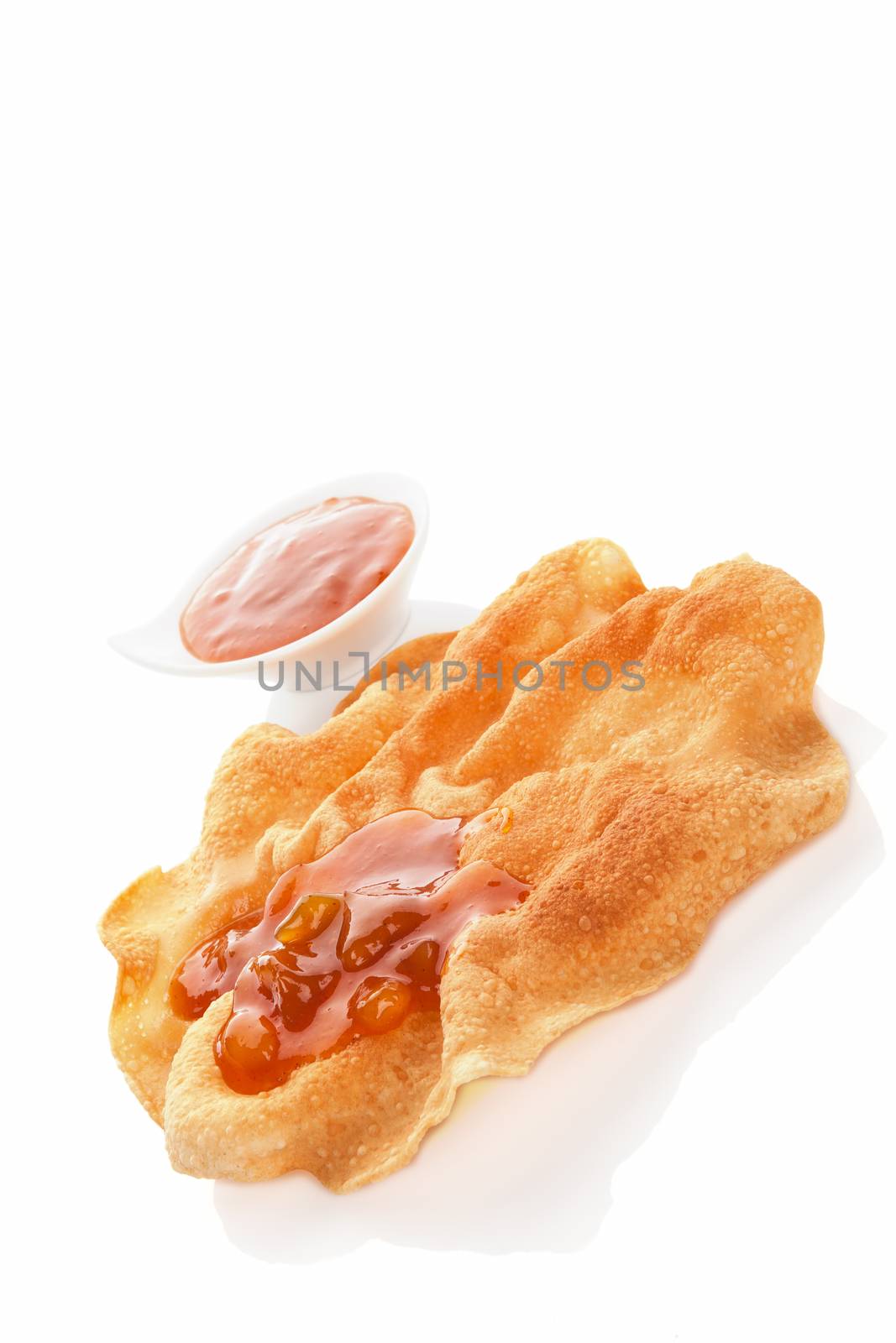 Culinary indian pappadum with chutney isolated on white background. Culinary indian eating concept.