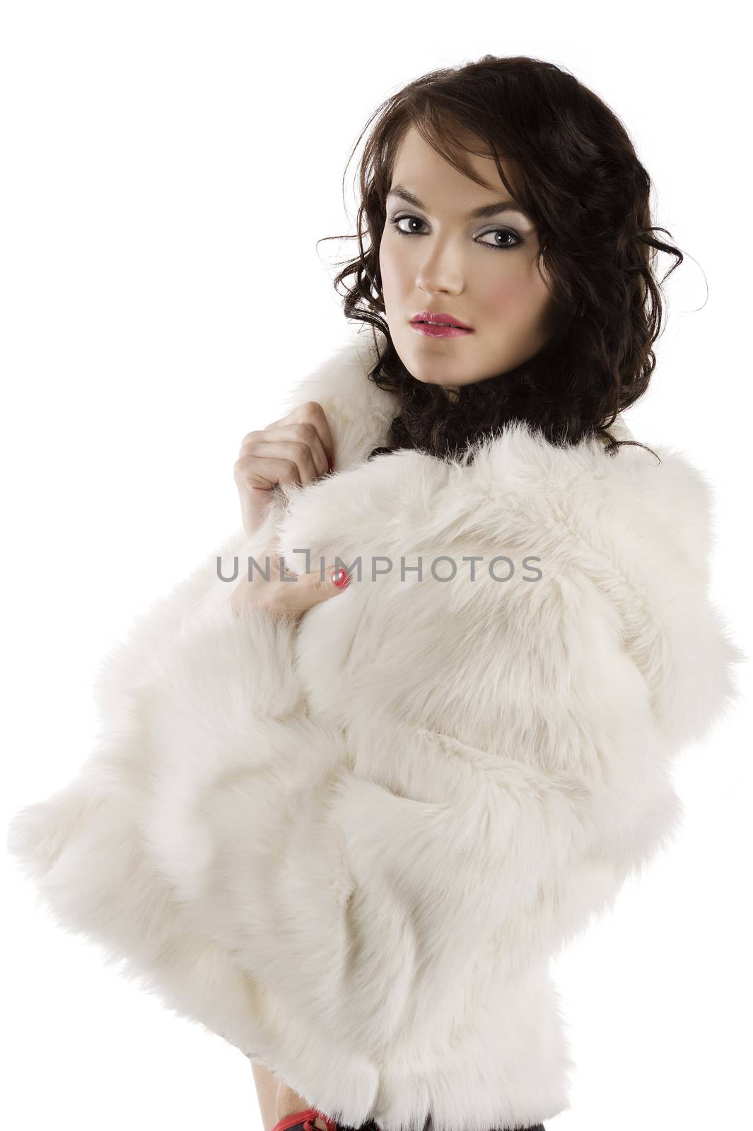 close up portrait of a brunette with make up and hair style waring a white fur