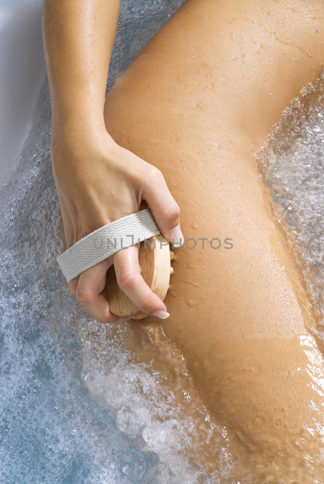 close up of woman body relaxing herself in a jacuzzi