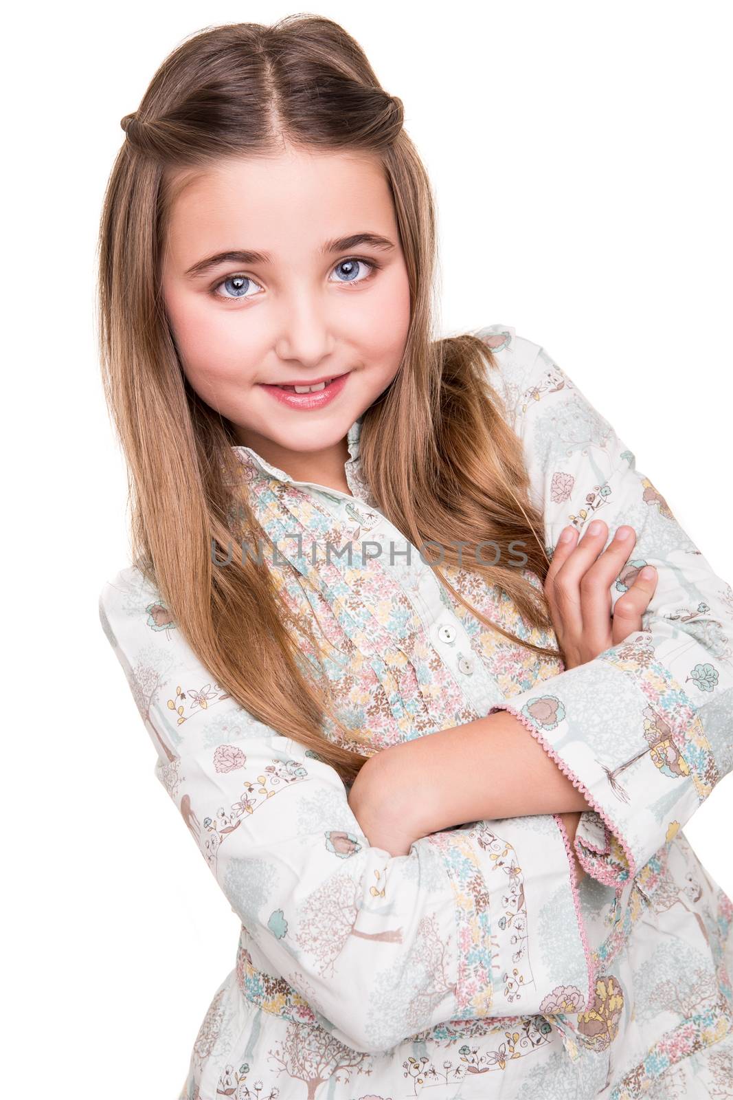 Portrait of a little girl over white background