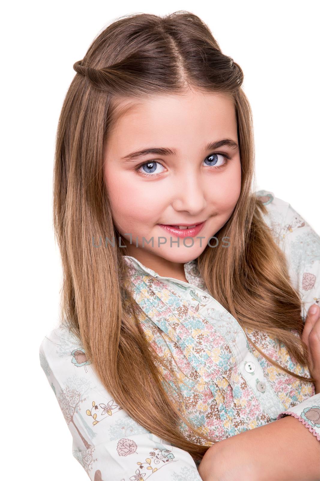 Portrait of a little girl over white background