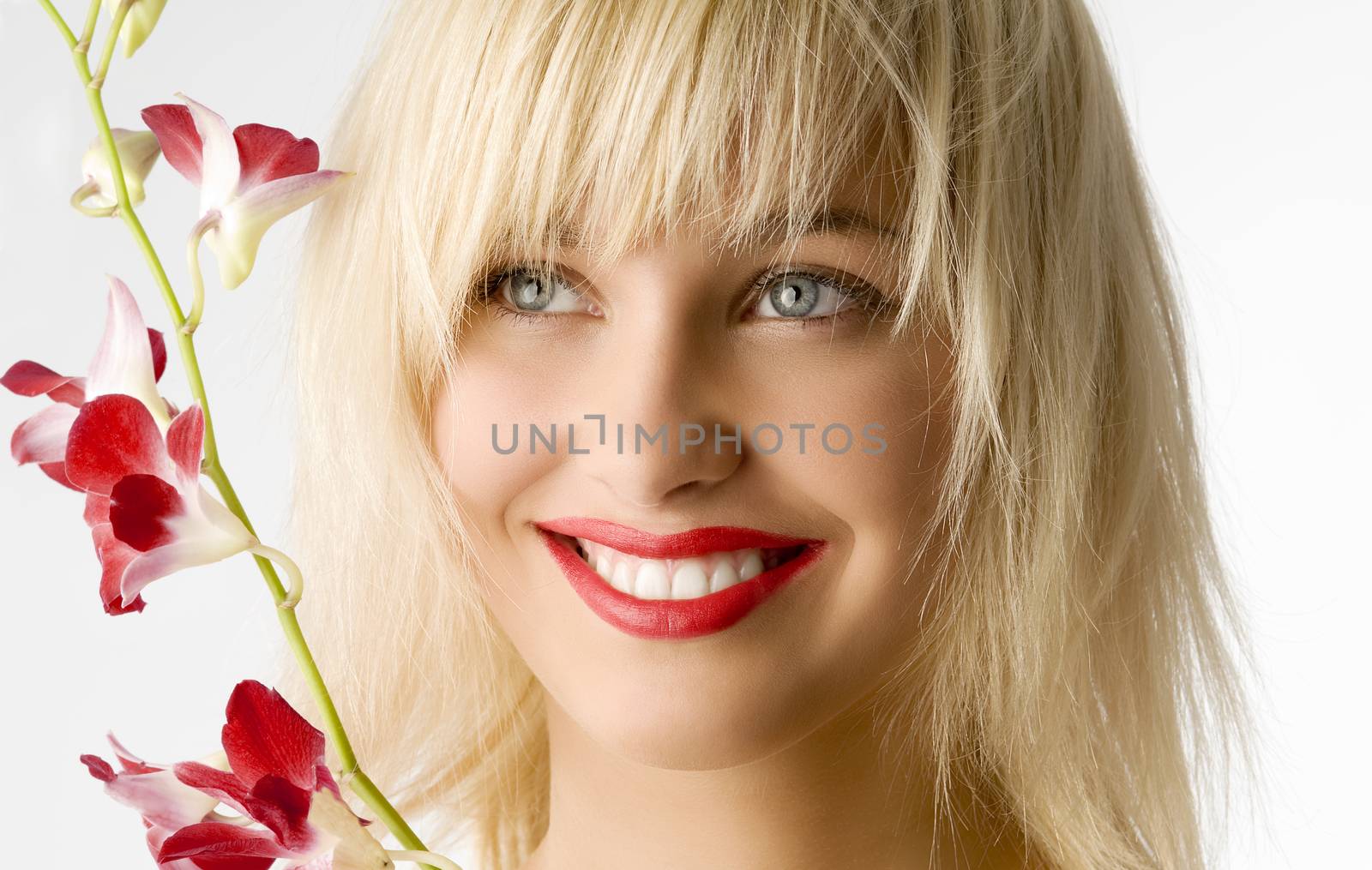 beauty style portrait of blond girl with flowers