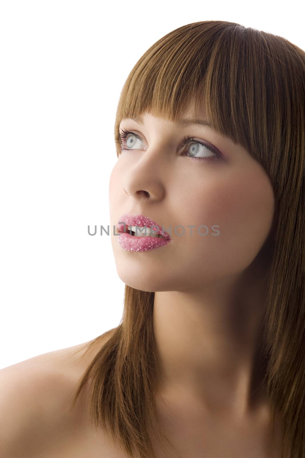 portrait of pretty and young brunette with sugar on her lips