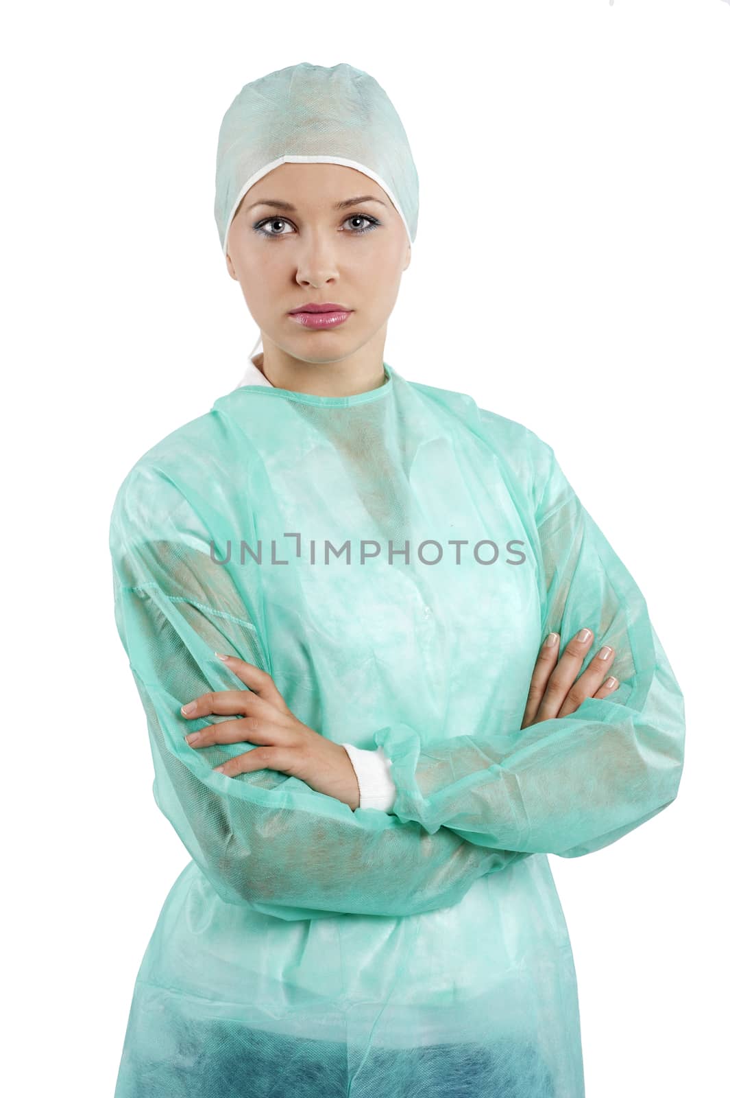 pretty young woman in green surgery dress looking in camera