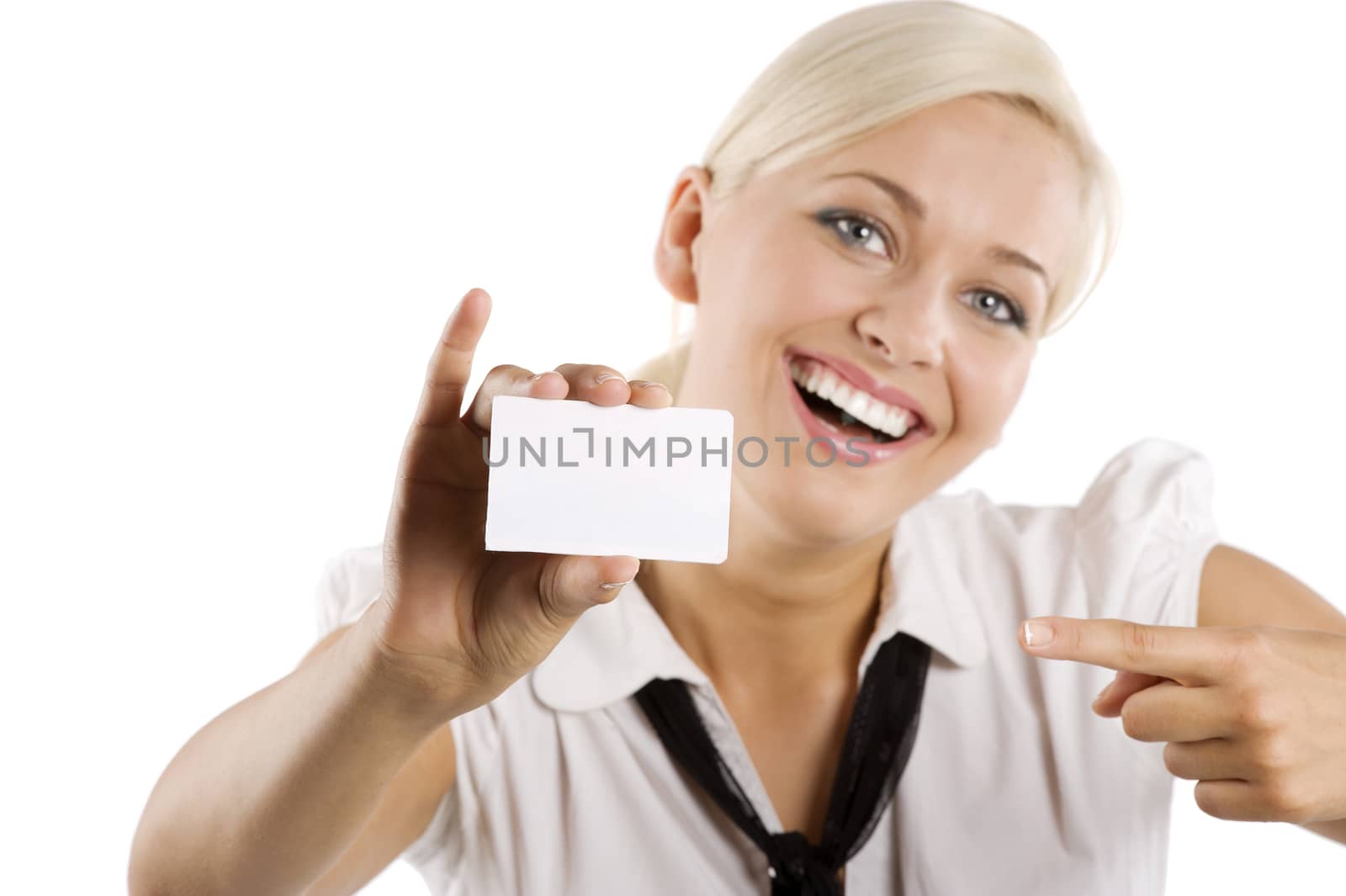 pretty young blond woman in white shirt and scarf like a tie showing a white card.FOCUS ON THE CARD