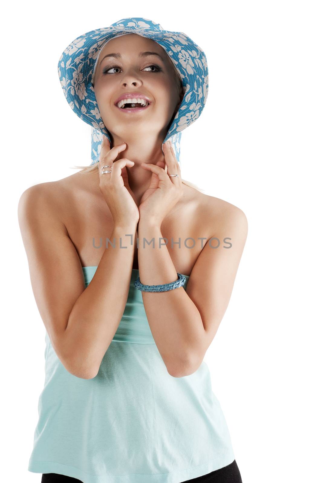 happy smiling woman in summer dress with fower hat looking