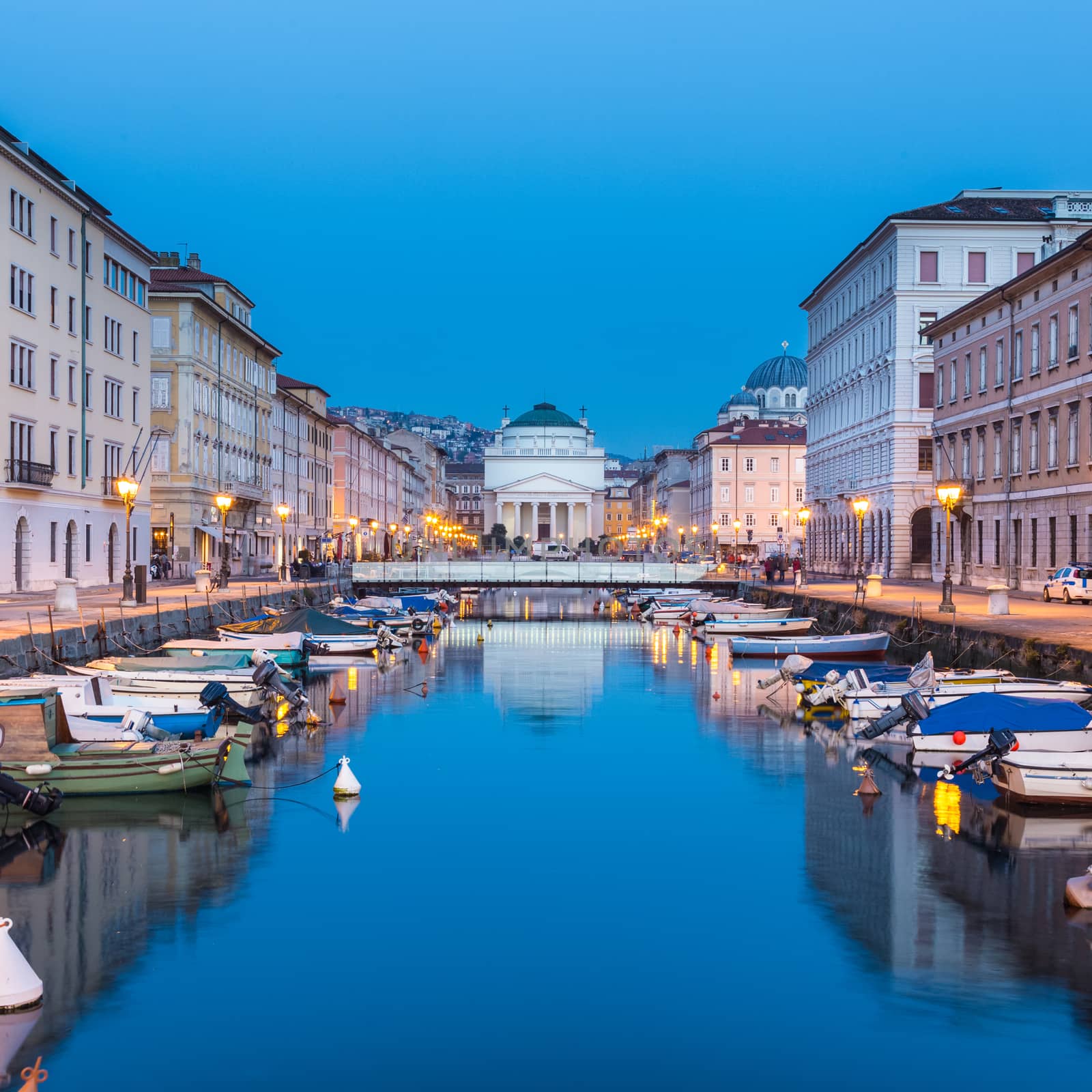 The huge church of St. Antonio Thaumaturgo is situated at the northern end of the Canale Grande. Its neo classical front facade and the cupola represents one of the emblems of the Trieste, city and seaport in northeastern Italy, Europe.