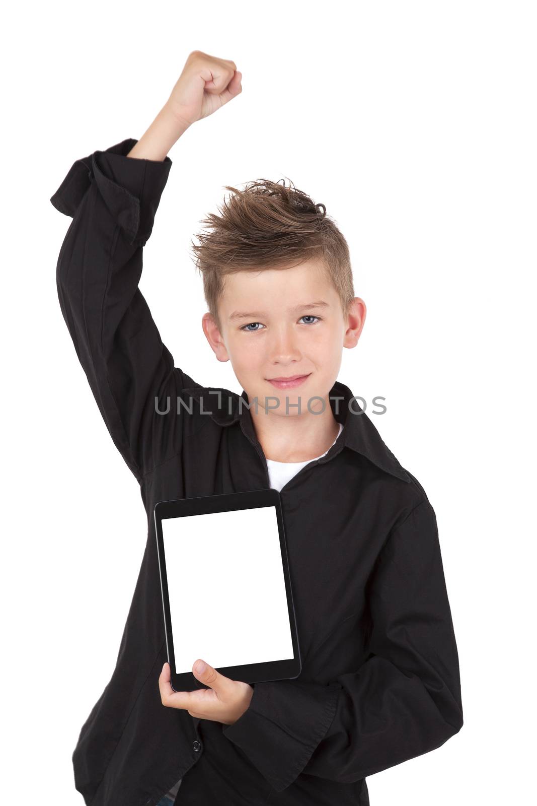 Boy holding tablet isolated on white. by eskymaks