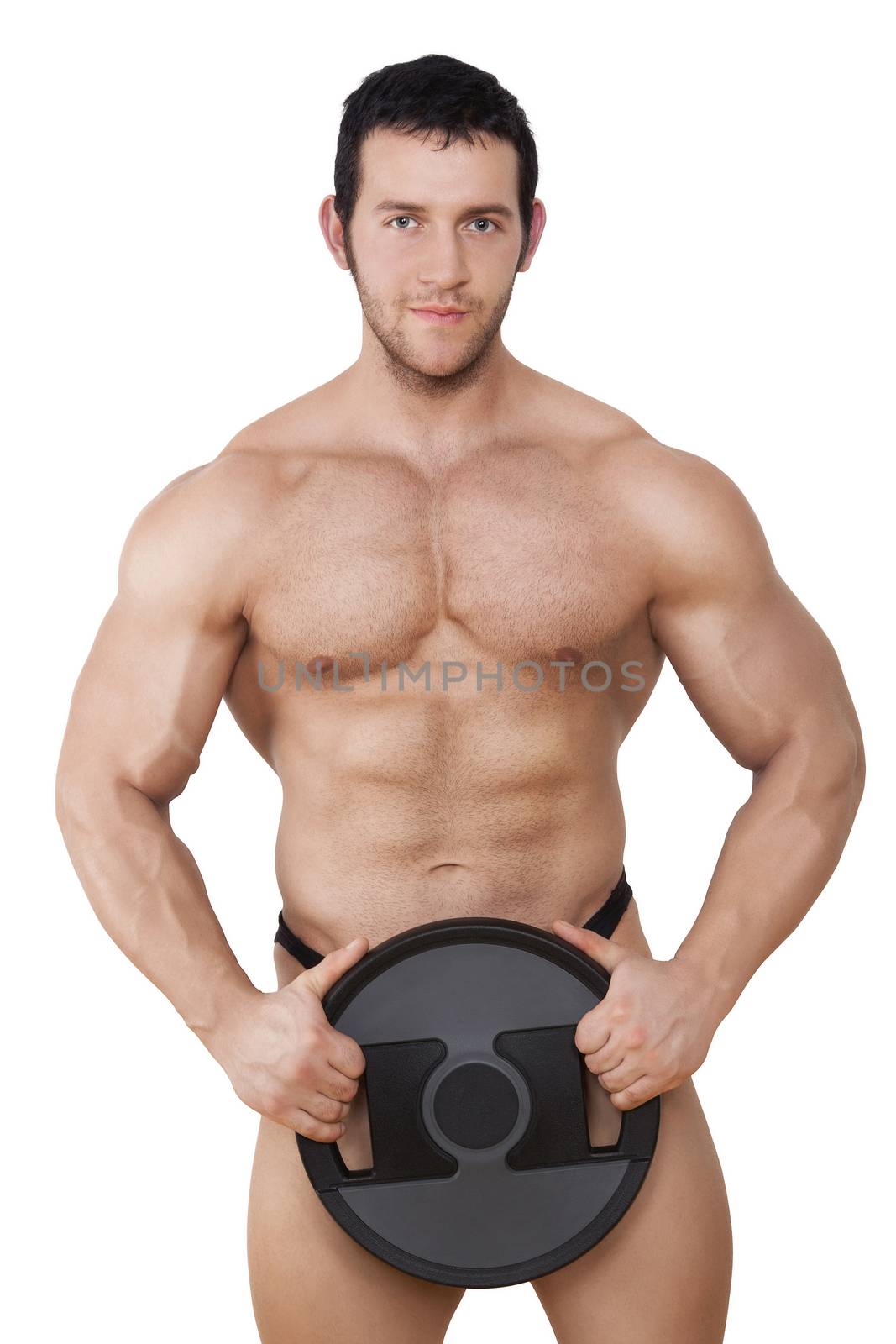 Young caucasian shirtless muscular man holding black round weight isolated on white background. Fitness, sport and health concept.