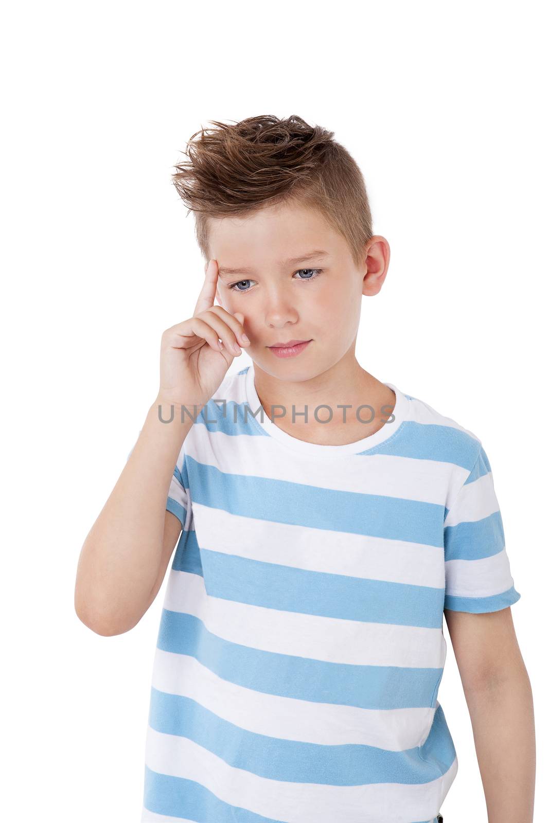 Charming young boy with cool haircut touching eyebrows and thinking isolated on white background.