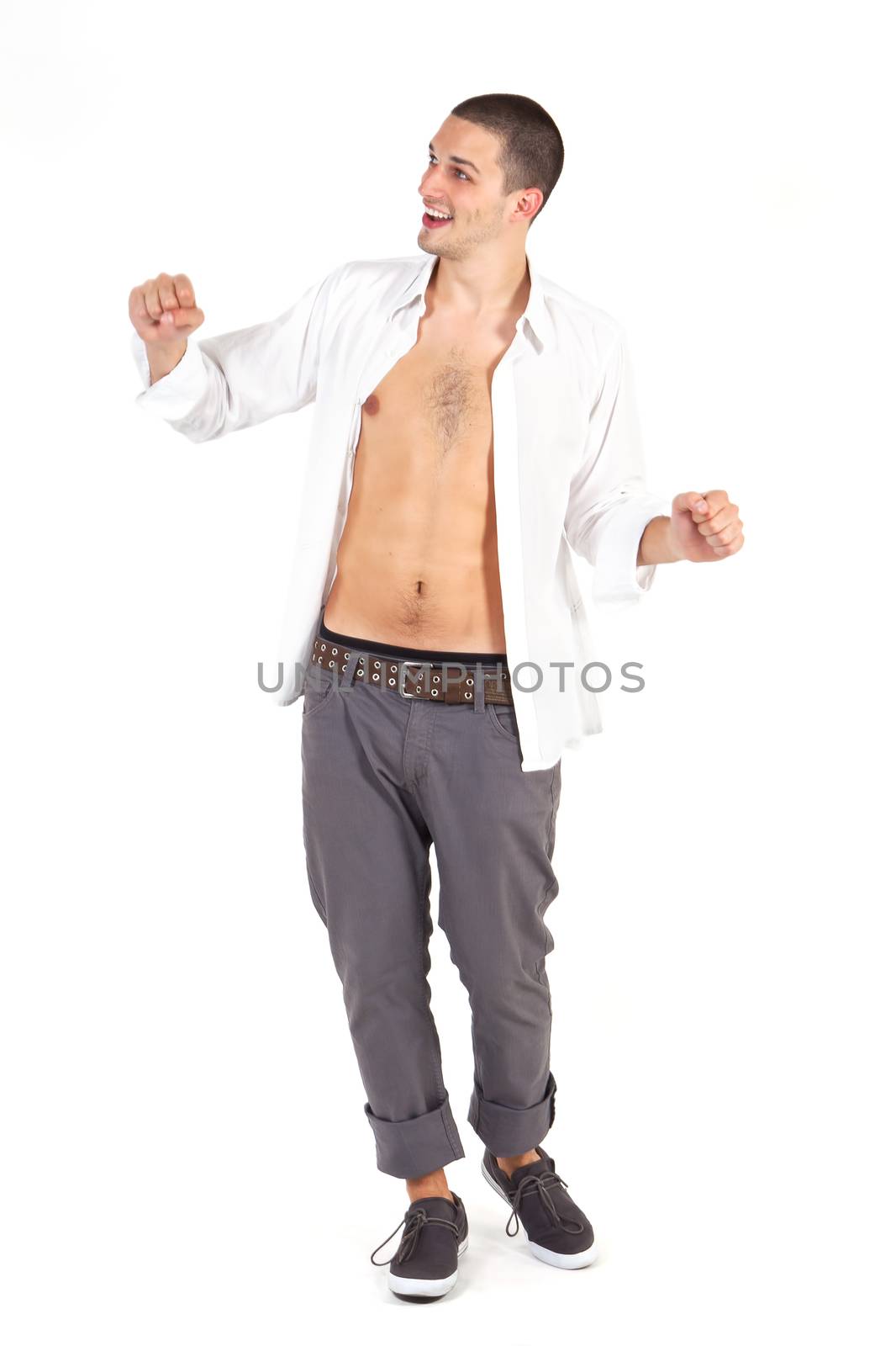 Cheerful young attractive male fashion model posing isolated on white background. Youth male fashion.
