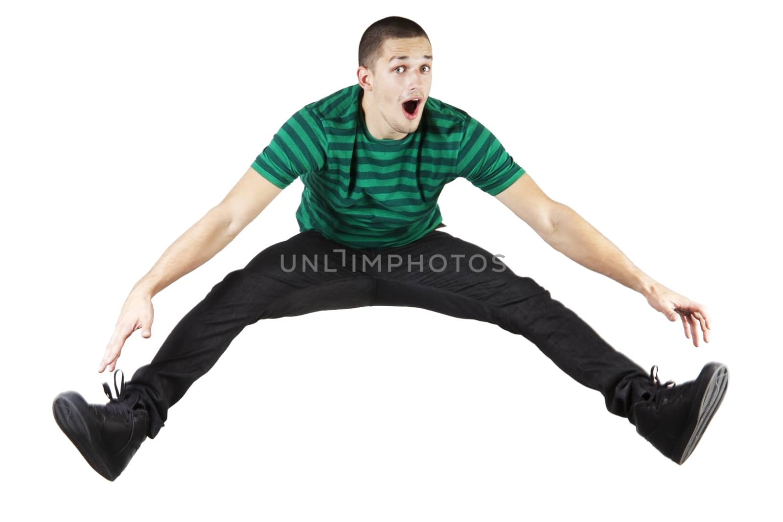 Young man in casual cloth jumping in the air isolated on white background.
