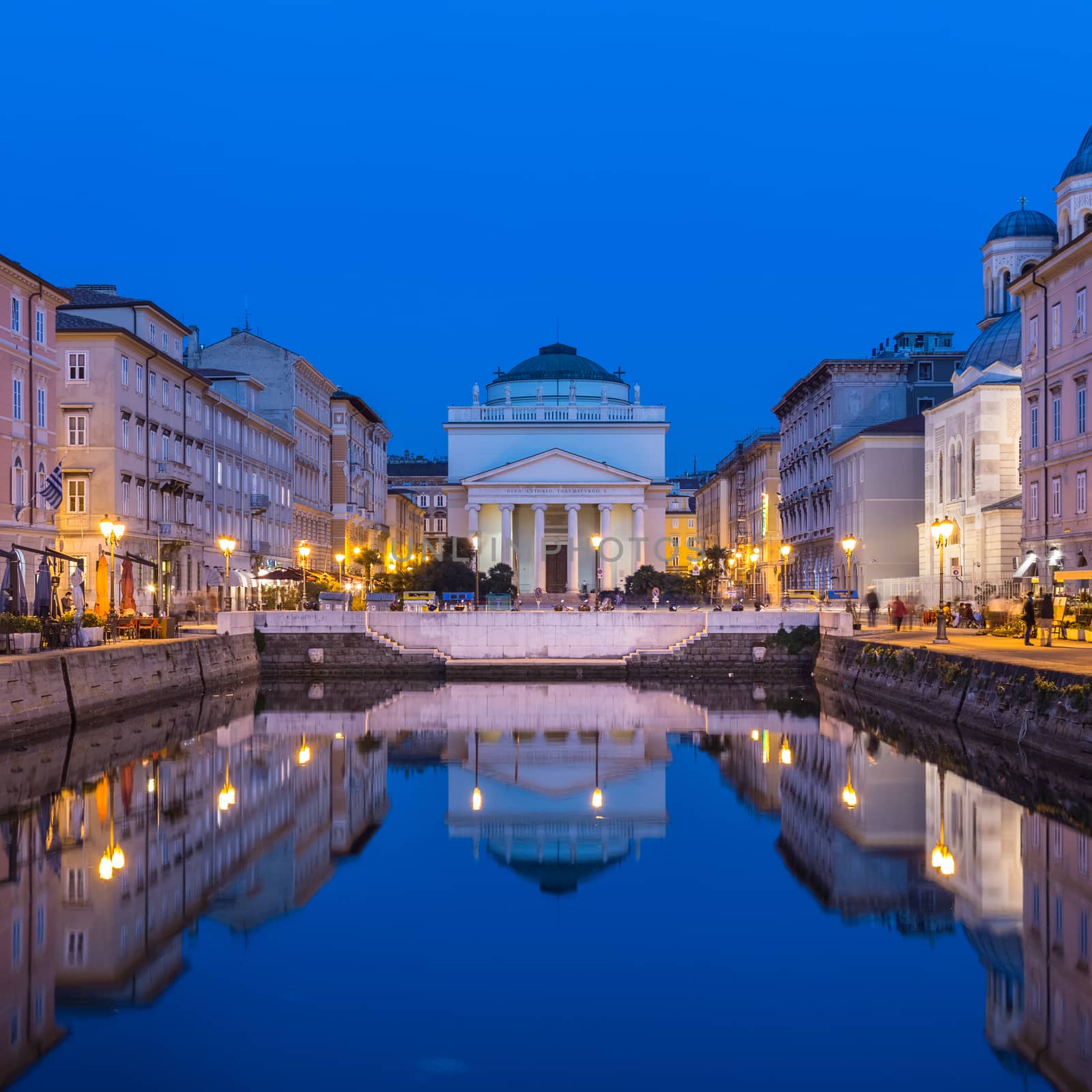 The huge church of St. Antonio Thaumaturgo is situated at the northern end of the Canale Grande. Its neo classical front facade and the cupola represents one of the emblems of the Trieste, city and seaport in northeastern Italy, Europe.